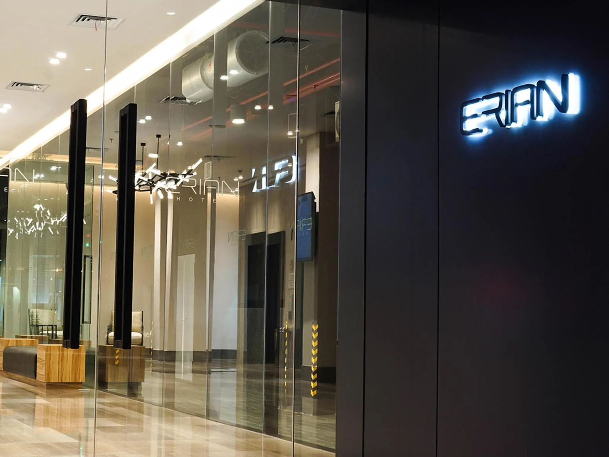 Property logo or sign in Erian Hotel