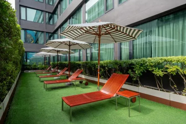 Swimming pool in VIC 3 Bangkok Hotel