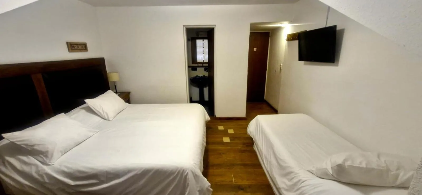 Bed in Hosteria Hostal del Esquiador