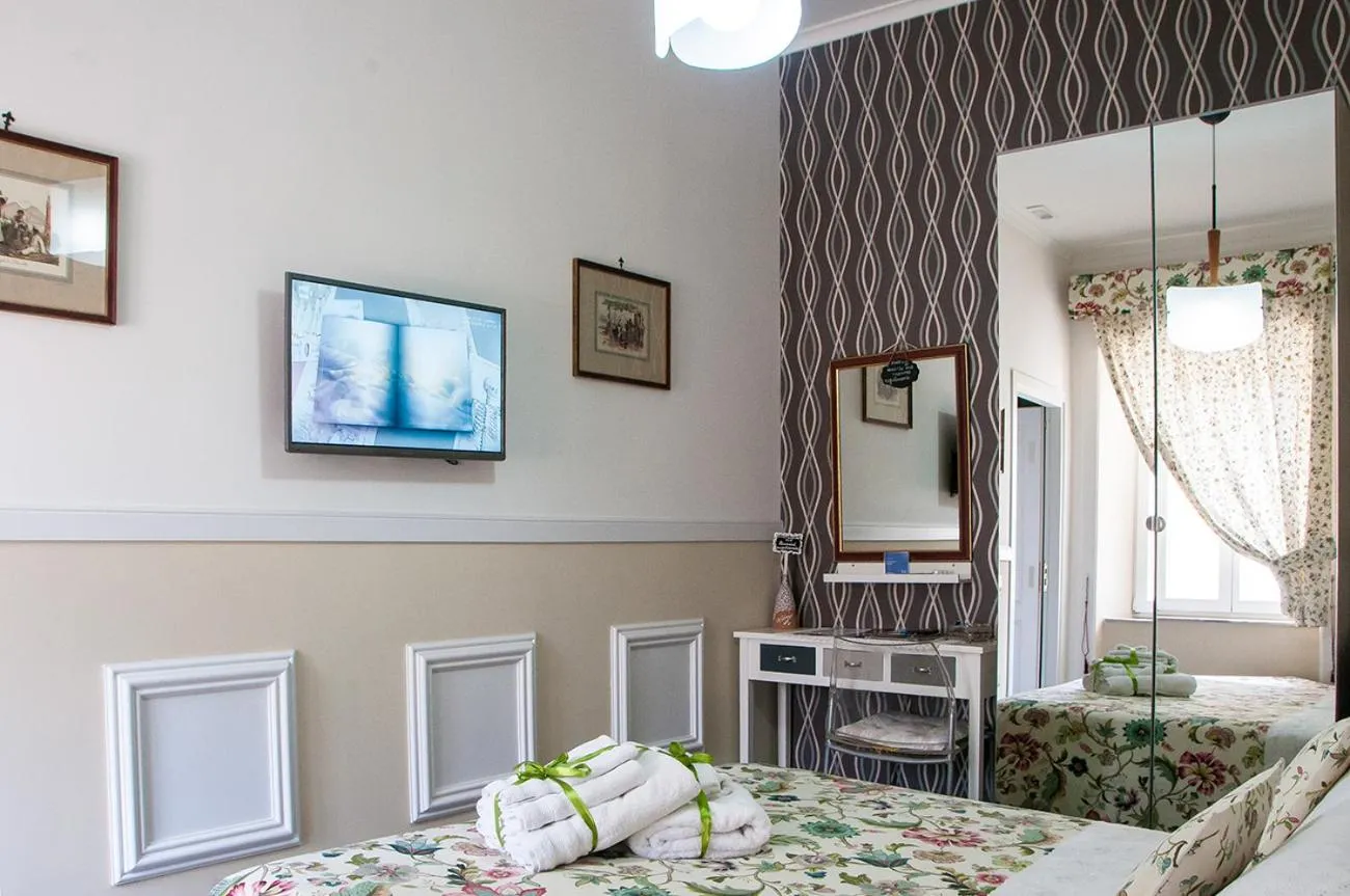 Photo of the whole room, Bed in La Terrazza ai Miracoli