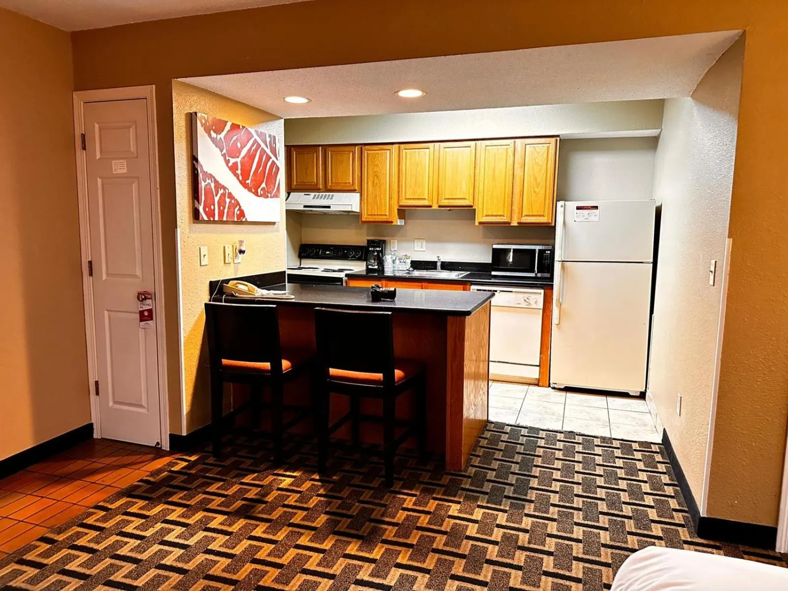 Kitchen or kitchenette in Hawthorn Extended Stay by Wyndham Wichita