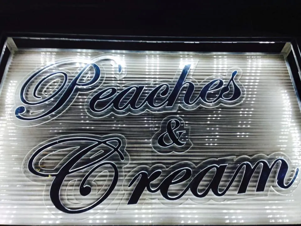 Logo/Certificate/Sign in Peaches & Cream Bed & Breakfast