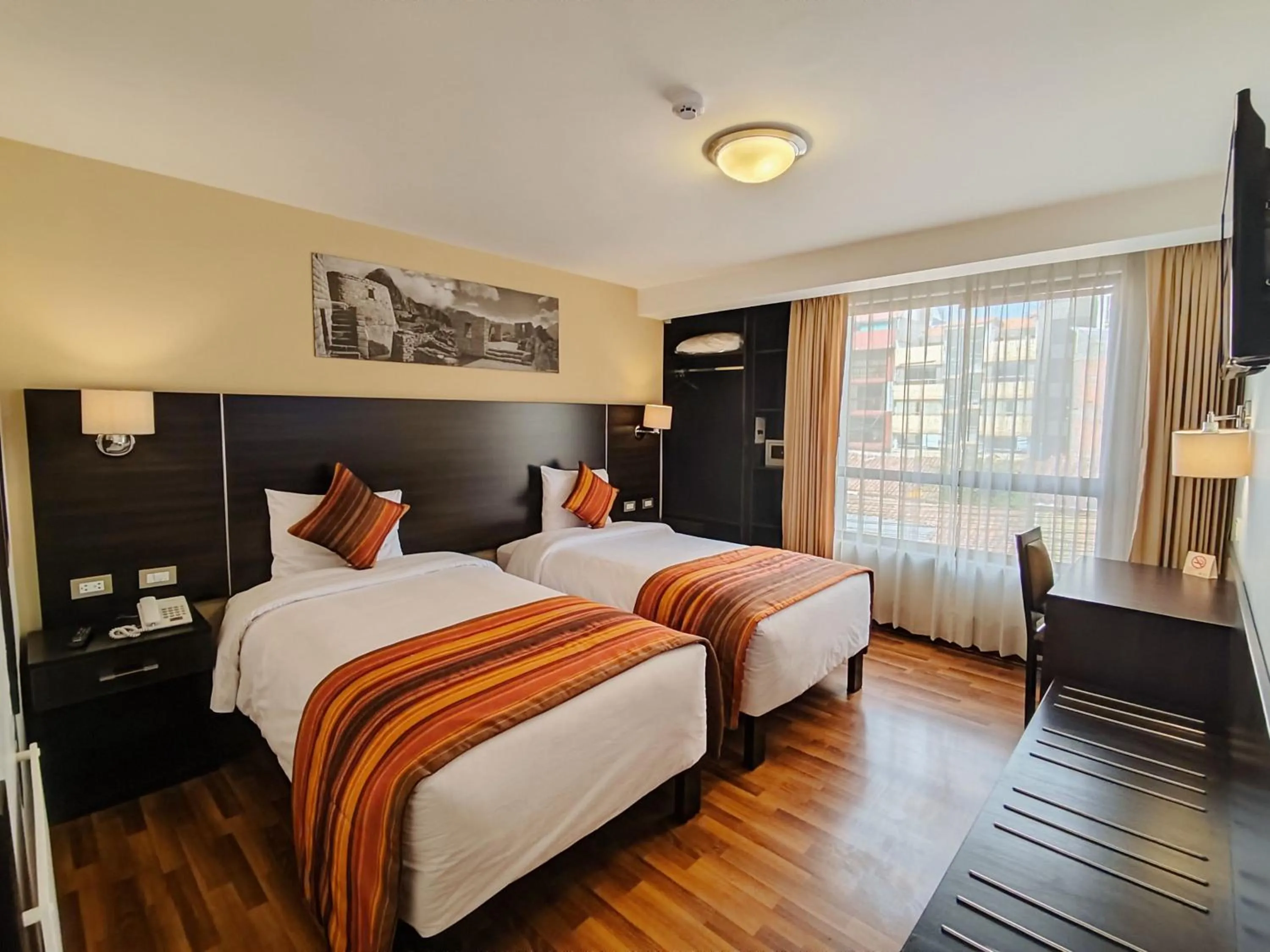 Bed in Royal Inn Cusco Hotel