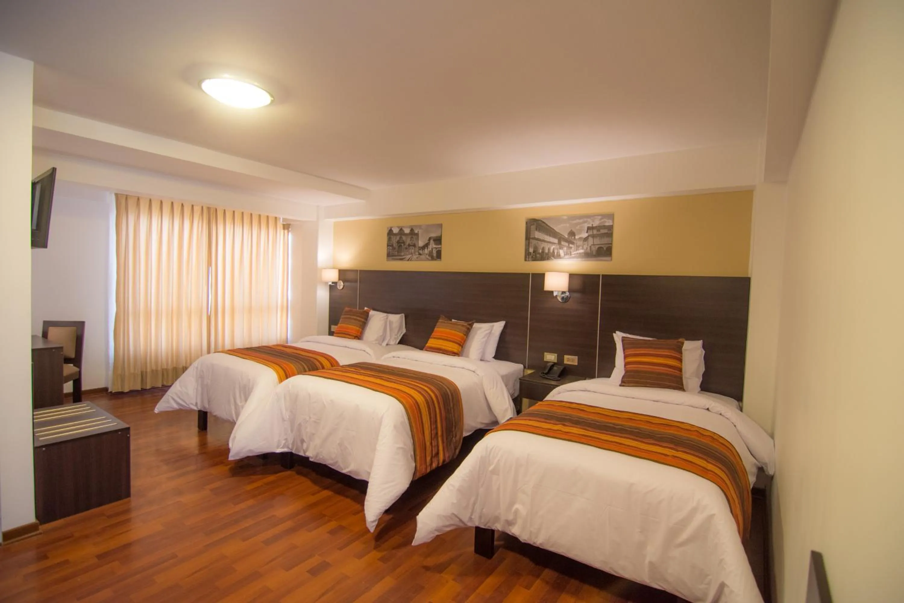 Bed in Royal Inn Cusco Hotel