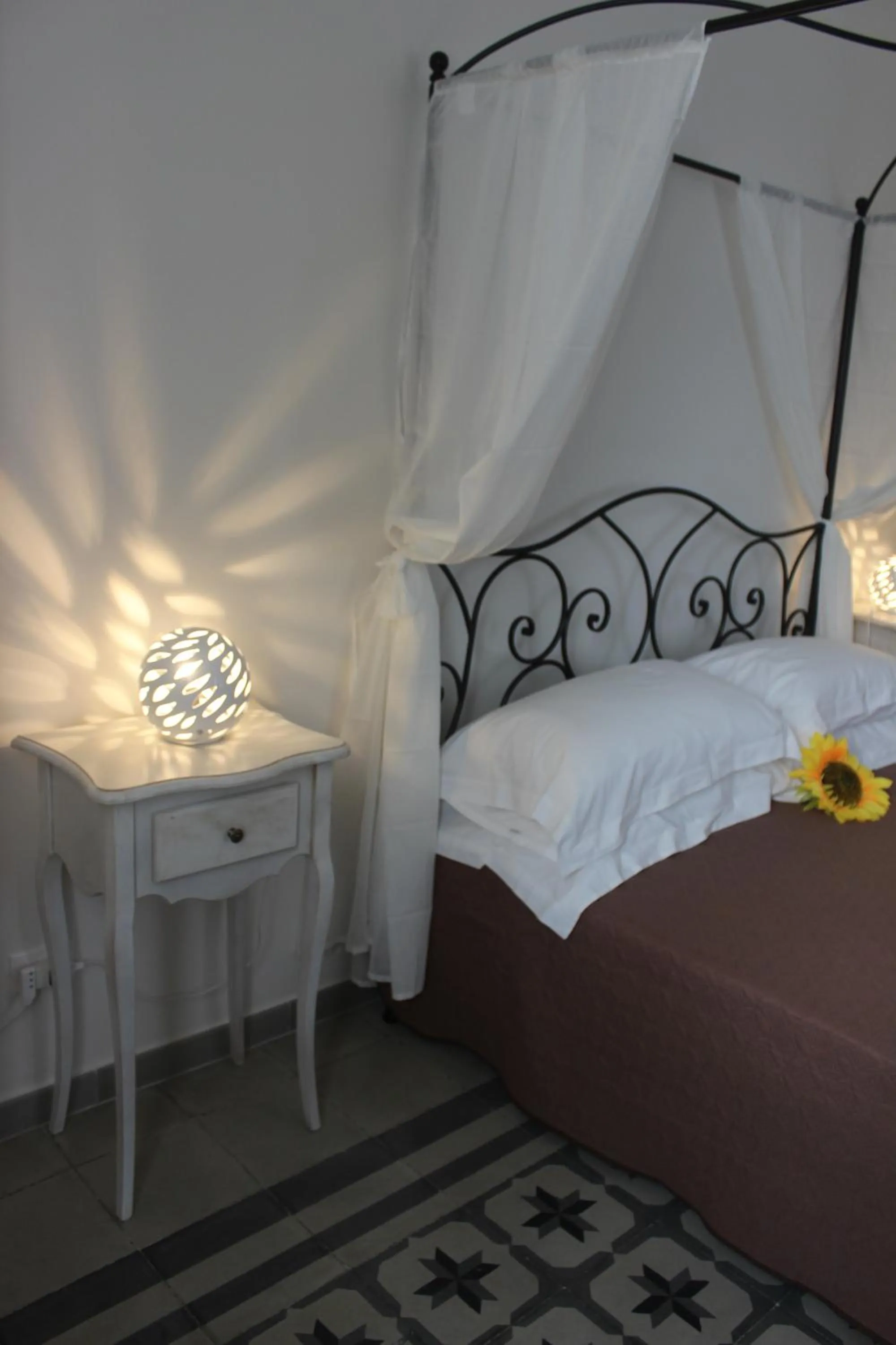 Photo of the whole room, Bed in Dimora Girolamo