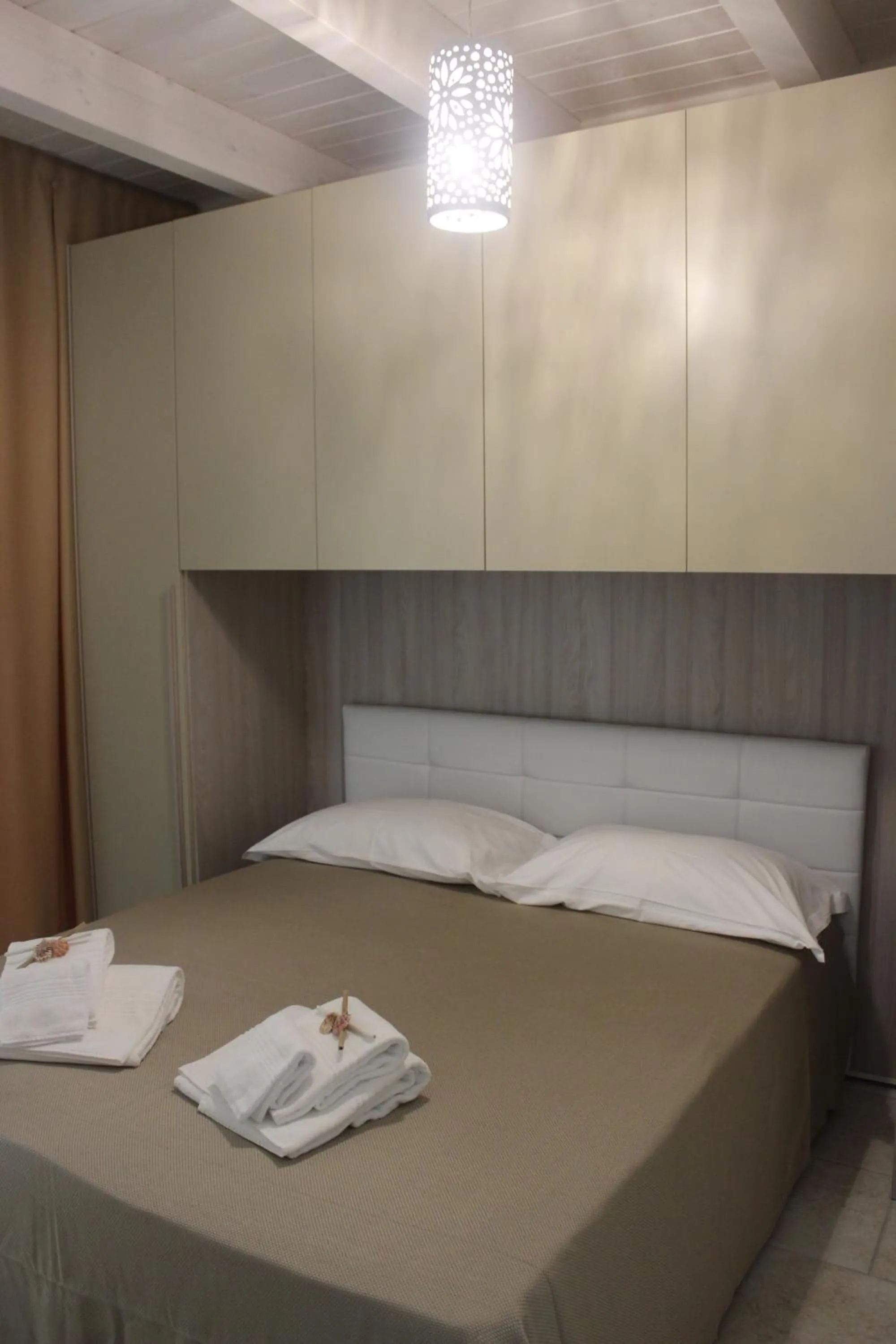 Photo of the whole room, Bed in Dimora Girolamo