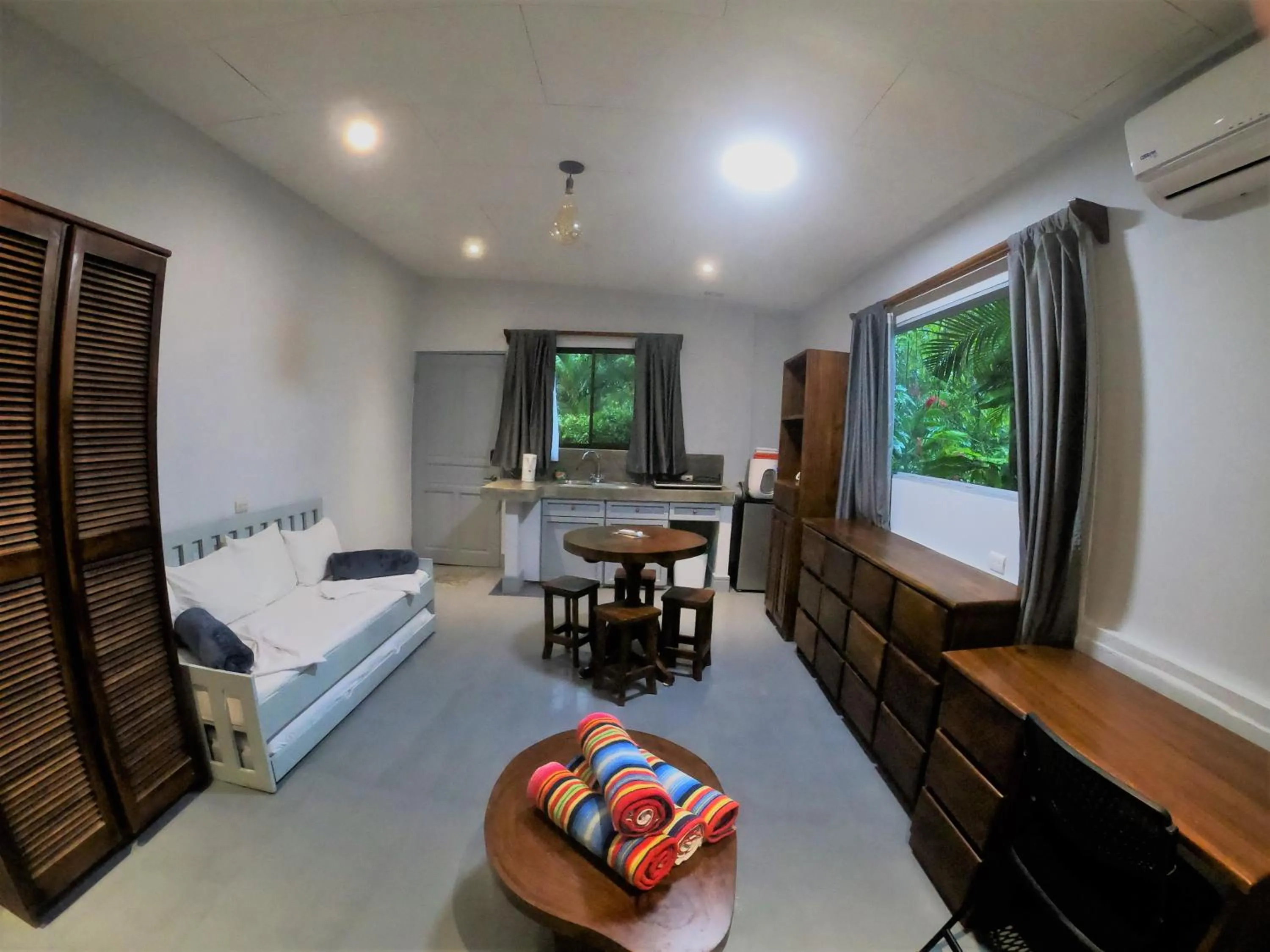 Seating area, Bed in Casa Cecilia Beach Front