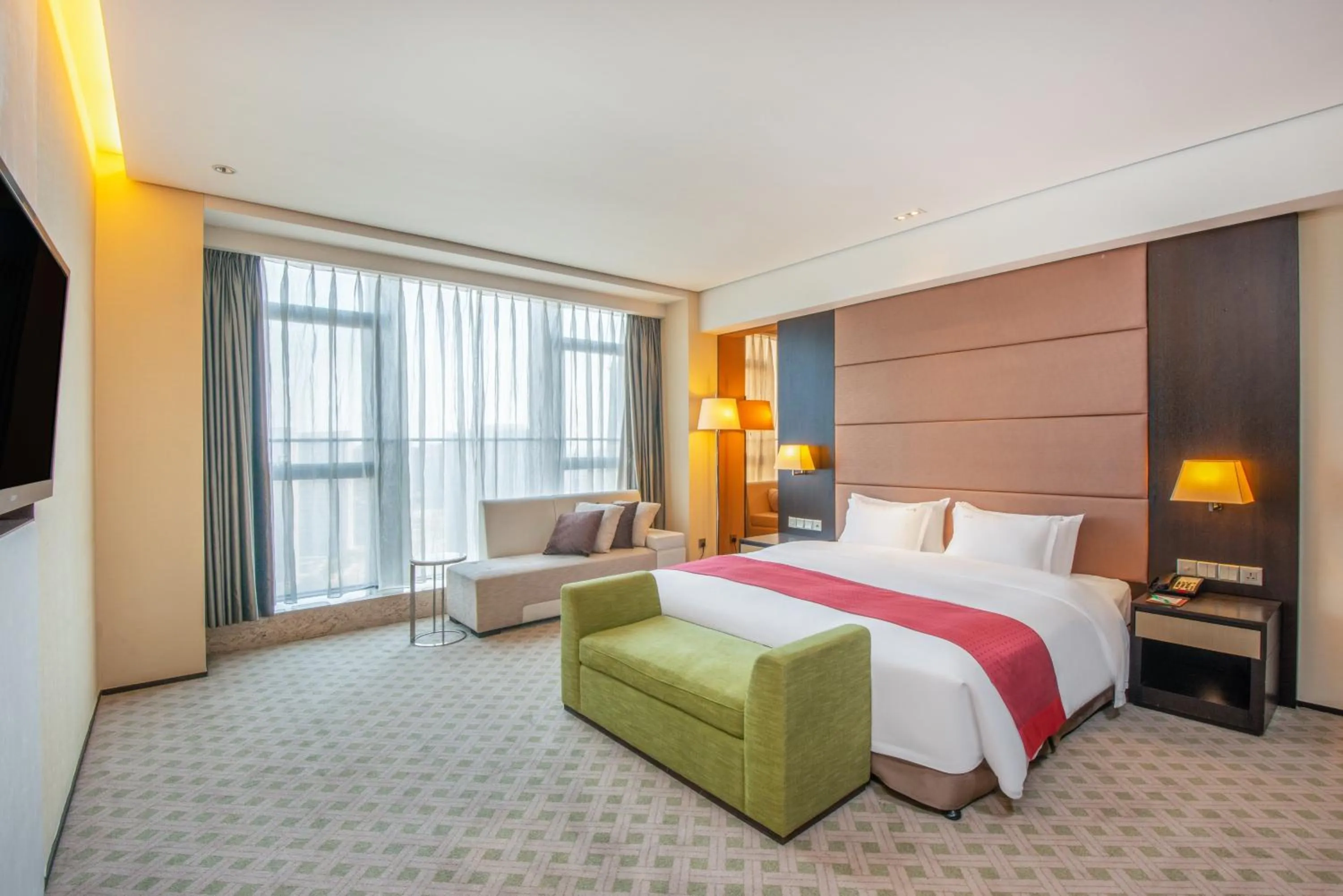 Photo of the whole room, Bed in Holiday Inn Nantong Oasis International by IHG