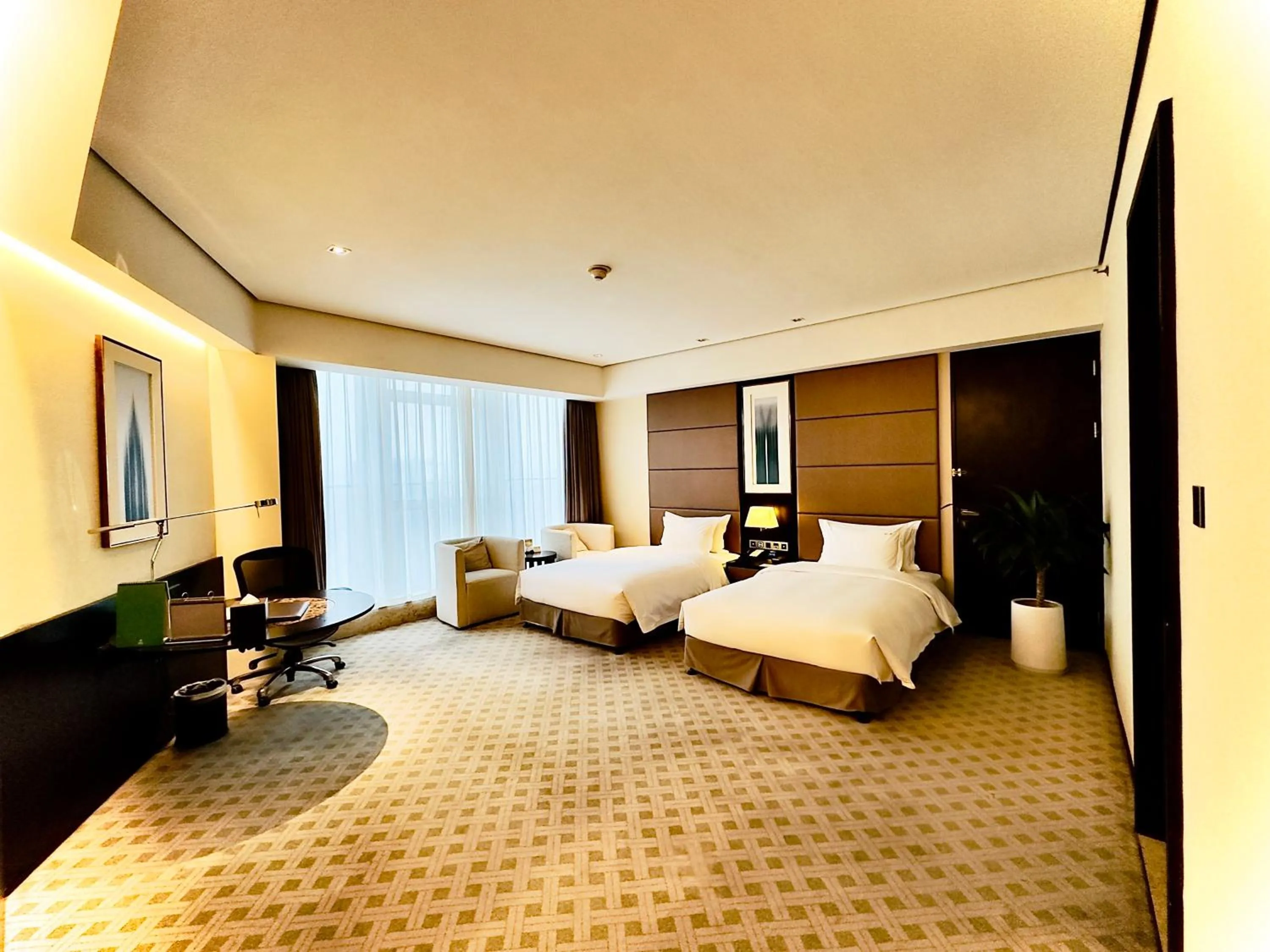 Photo of the whole room, Bed in Holiday Inn Nantong Oasis International by IHG