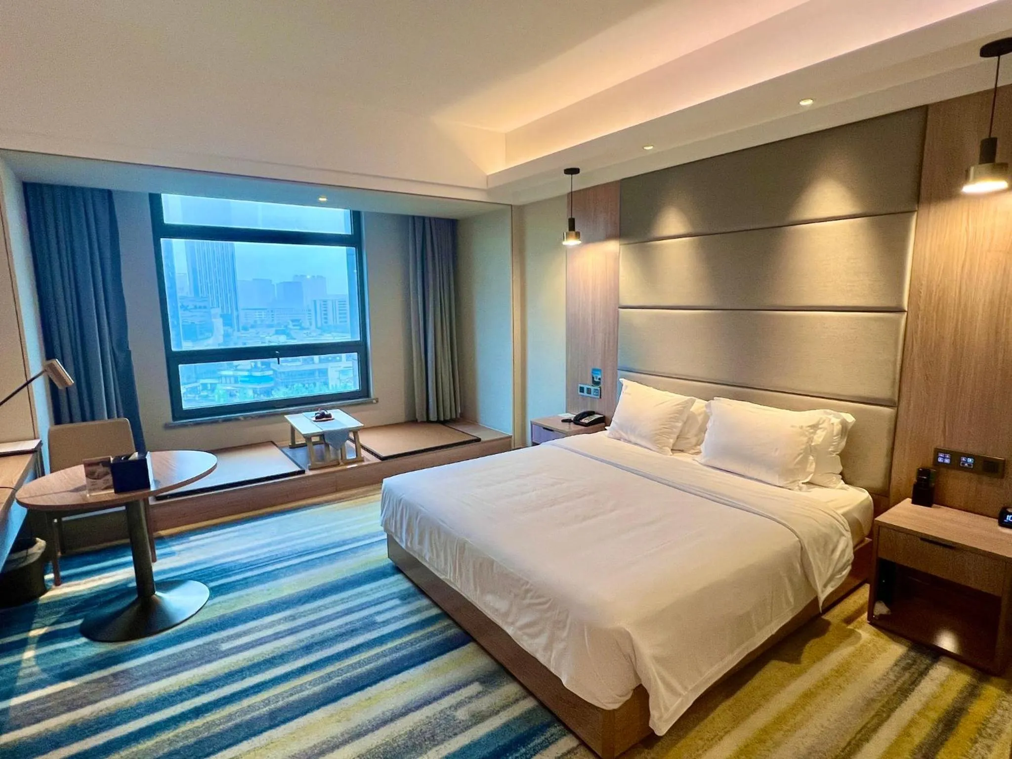 Photo of the whole room, Bed in Holiday Inn Nantong Oasis International by IHG