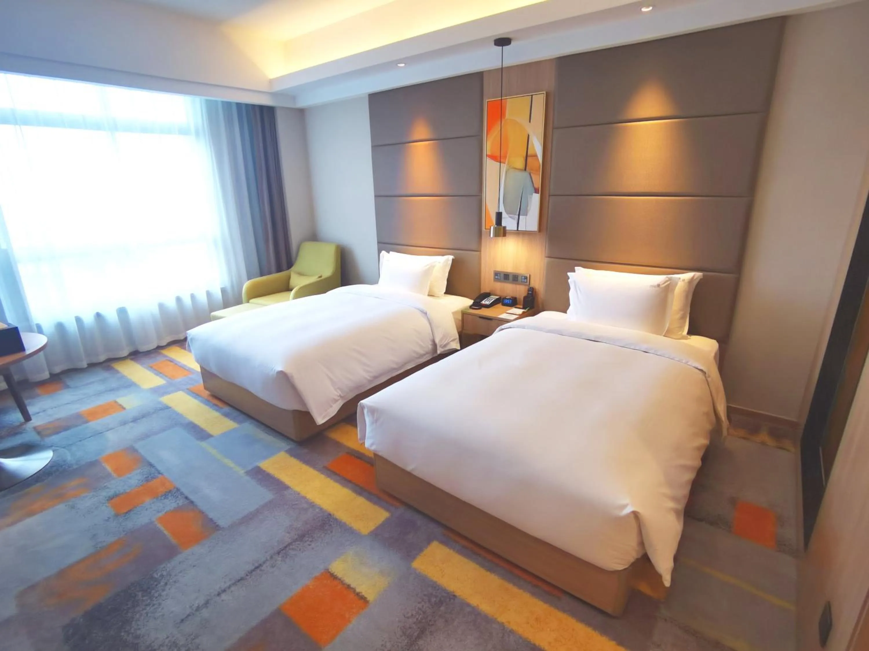 Photo of the whole room, Bed in Holiday Inn Nantong Oasis International by IHG