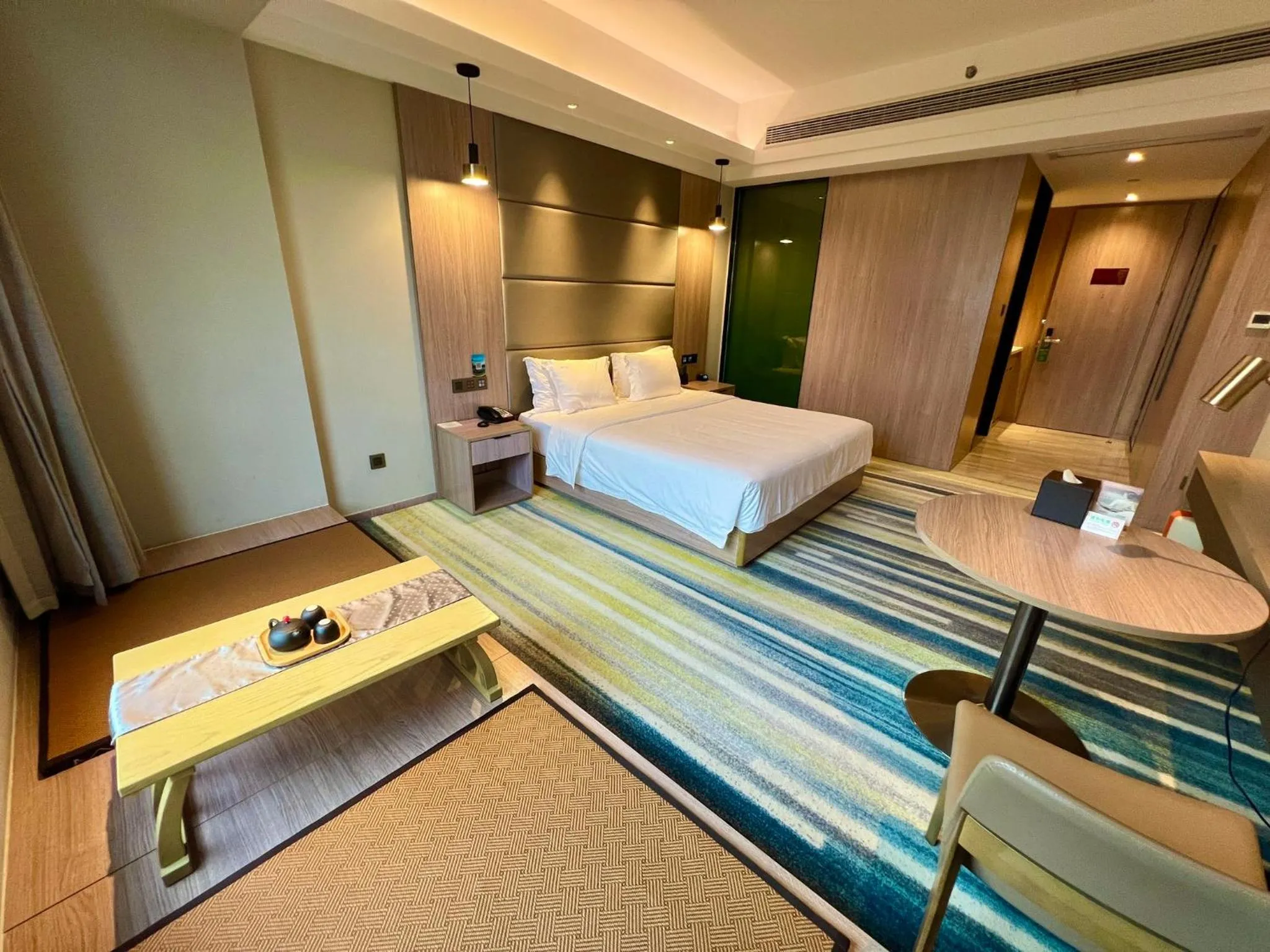 Photo of the whole room, Bed in Holiday Inn Nantong Oasis International by IHG