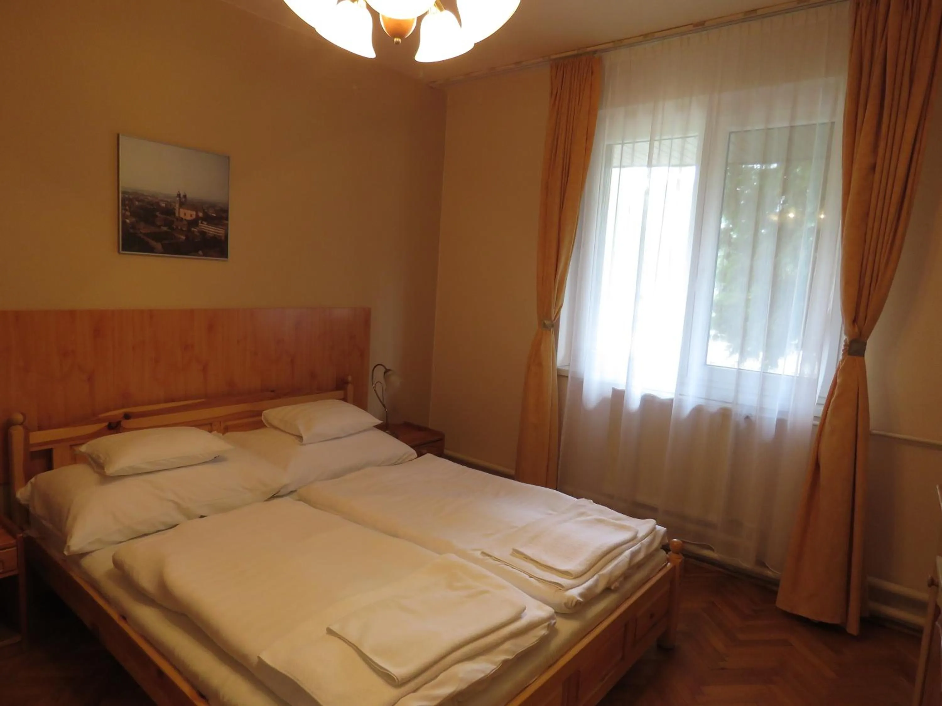 Photo of the whole room, Bed in Thermál Apartmanház