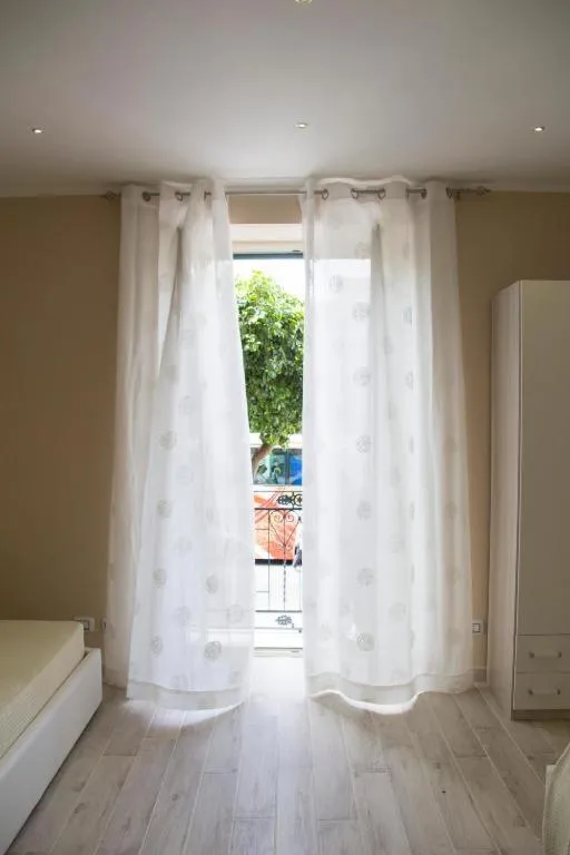 Photo of the whole room, Bed in Monte Palace Palermo