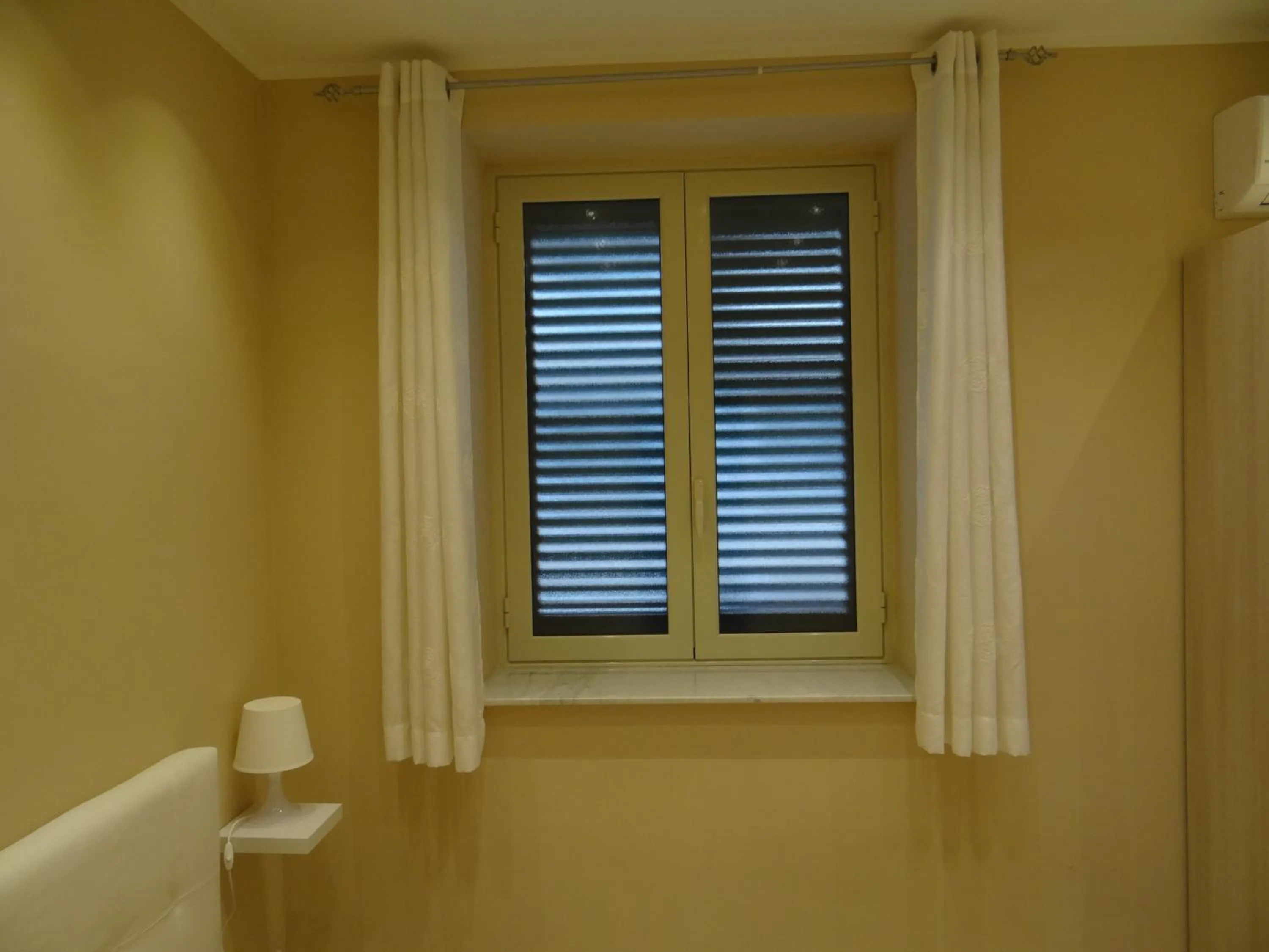 Bedroom in Monte Palace Palermo