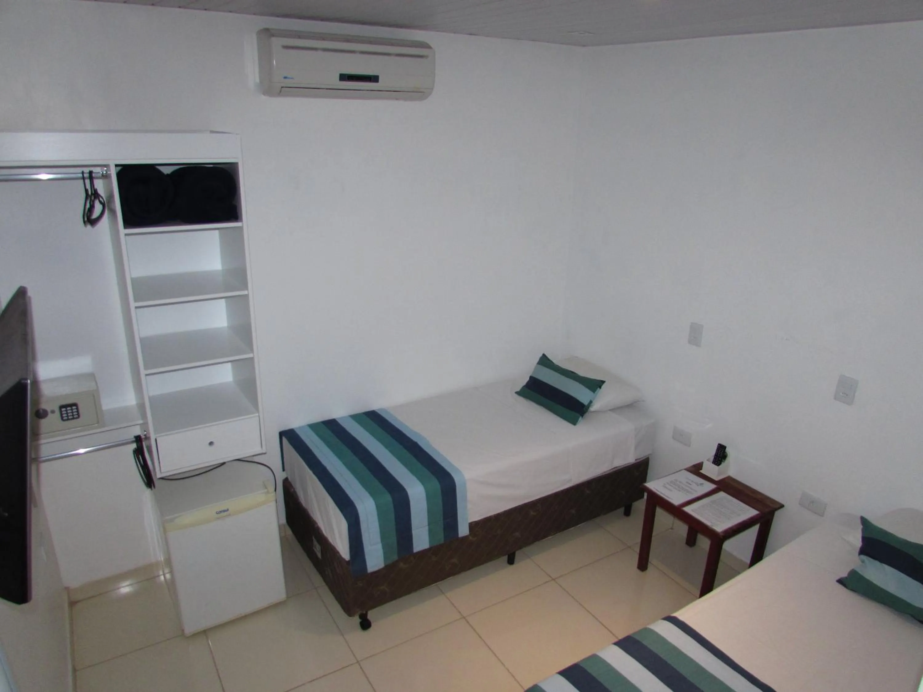 Bed in Pousada Muito Bonito