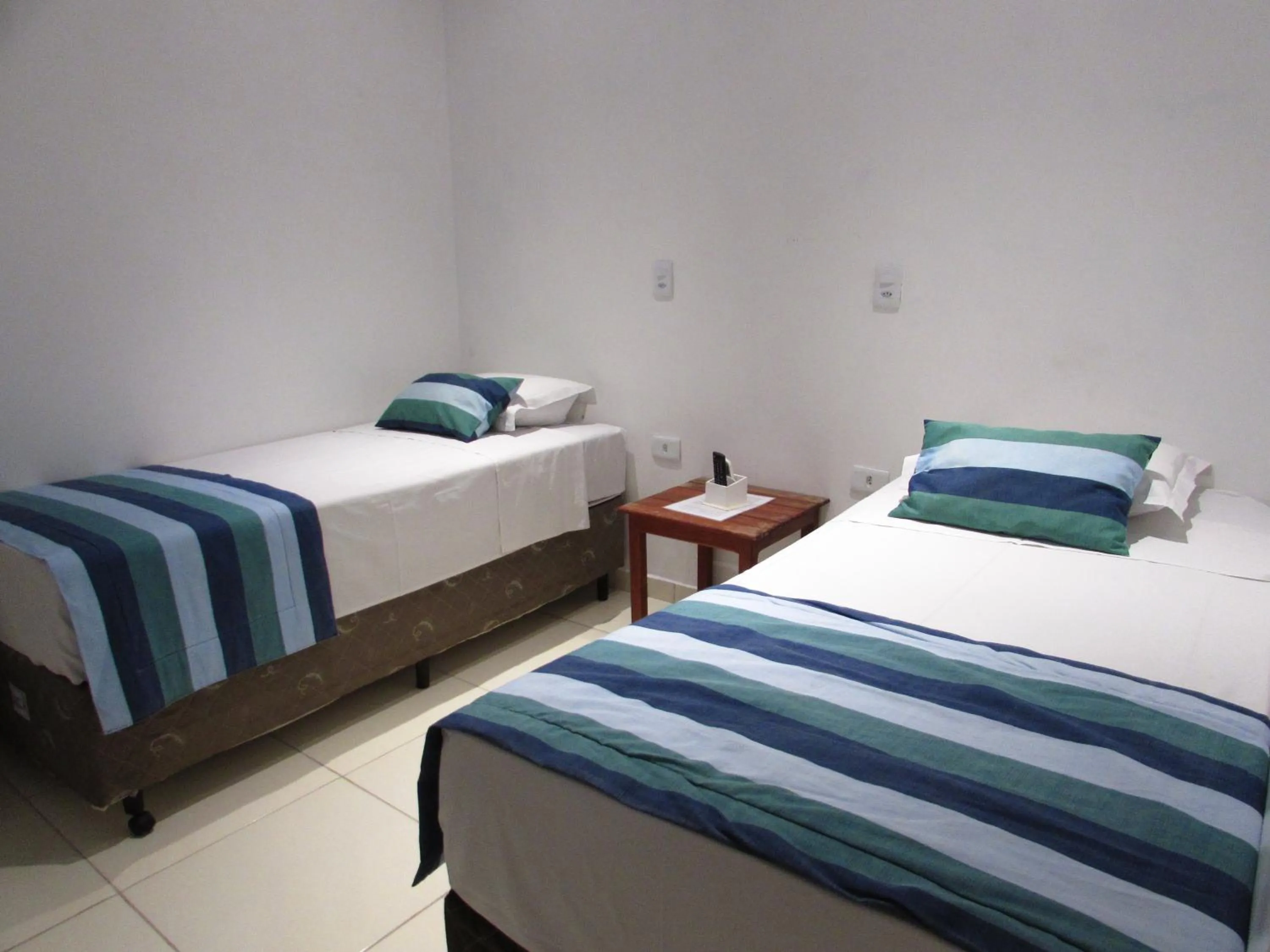 Bed in Pousada Muito Bonito