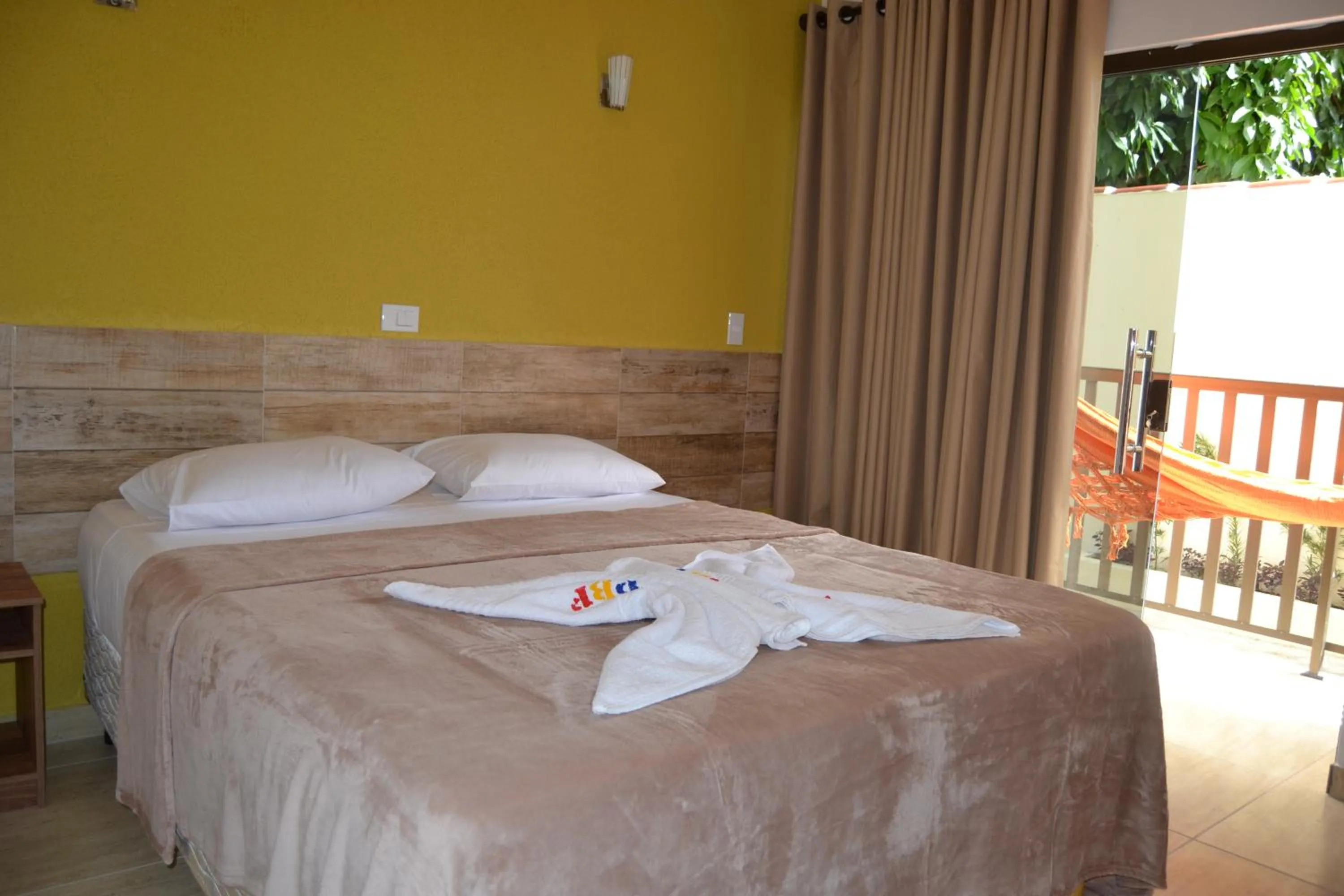 Bed in Pousada Beija Flores