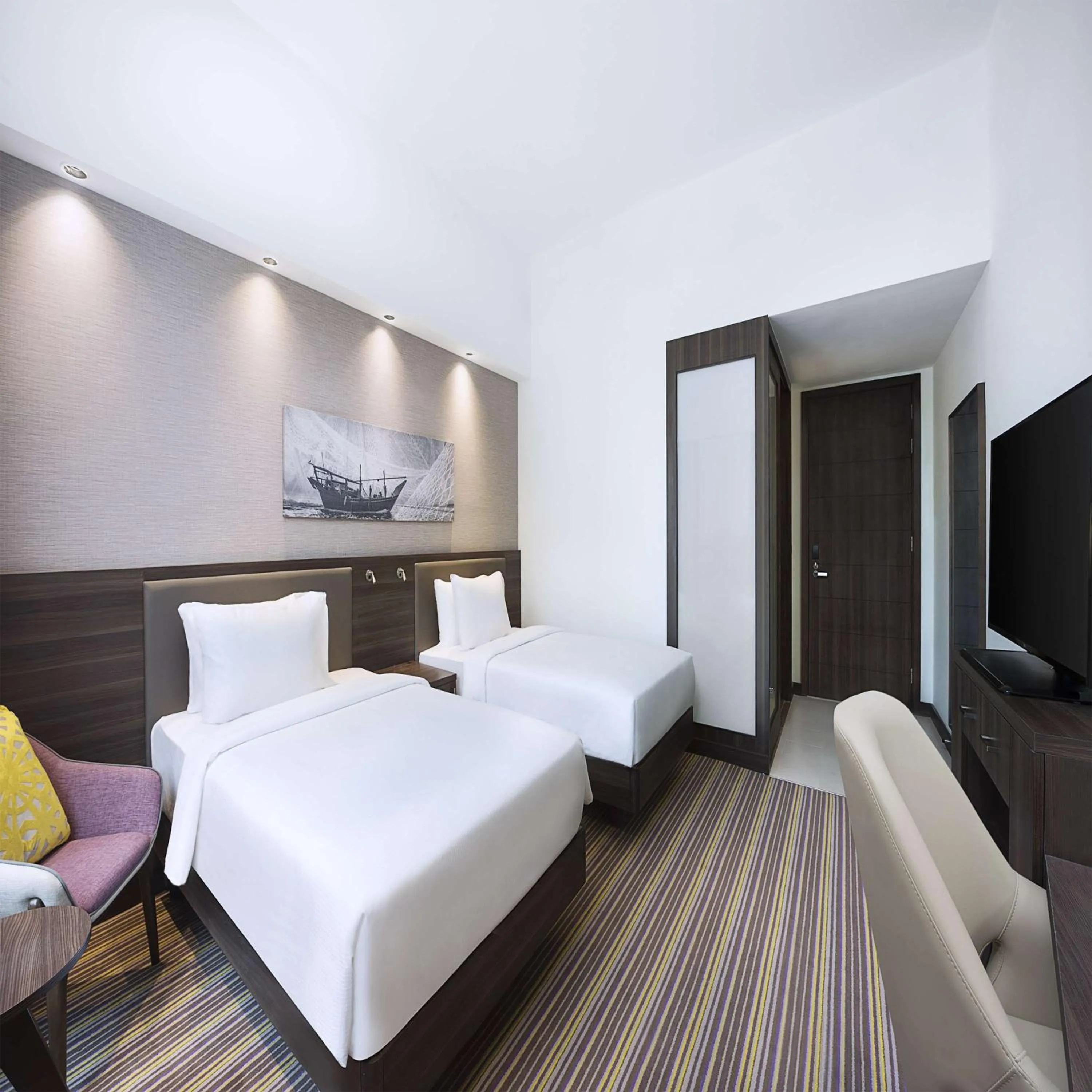 Twin Family Connecting Room with Sofa Bed in Hampton By Hilton Dubai Airport