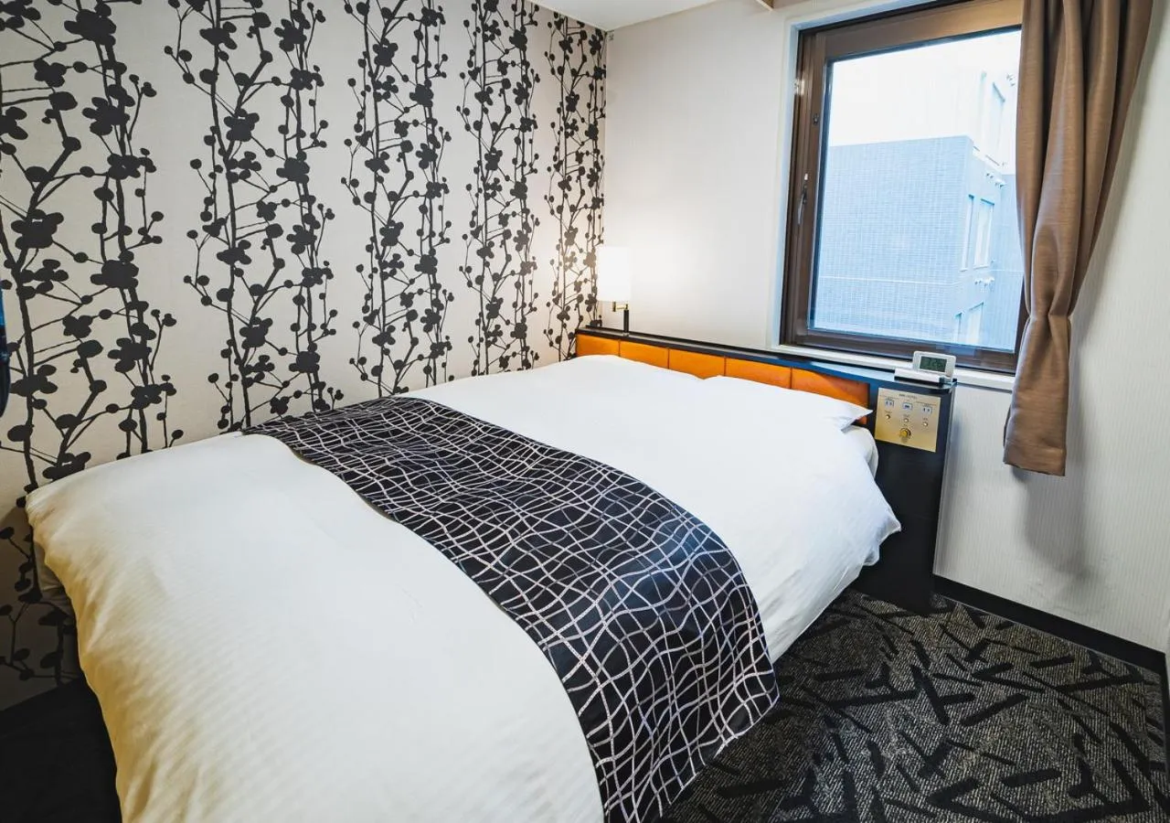 Bed in Apa Hotel Sapporo-Odorikoen