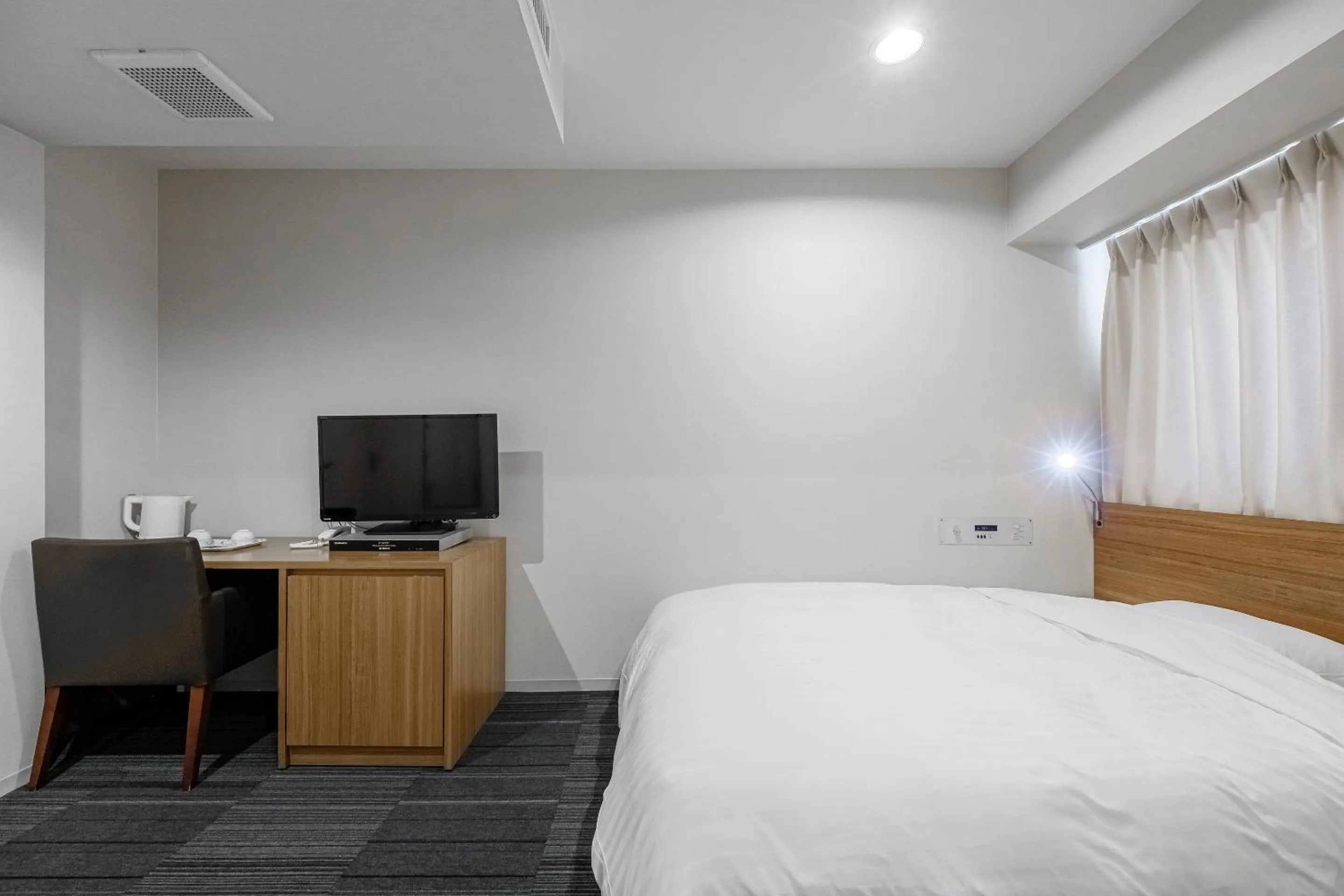 Bed in Tabist Annex Hotel Tetora Hakodate