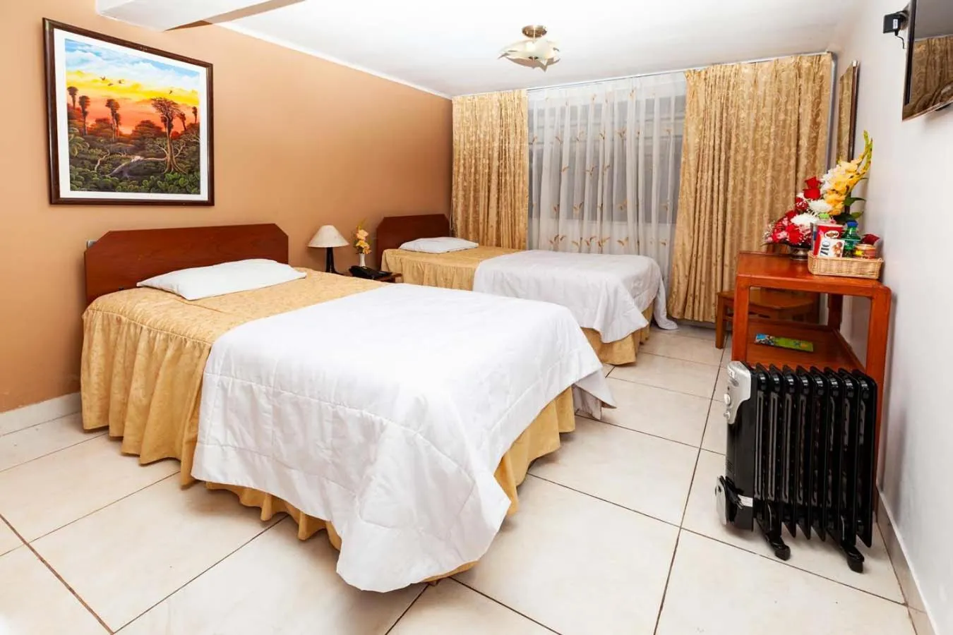 Bed in Hotel Sol del Oriente Cusco