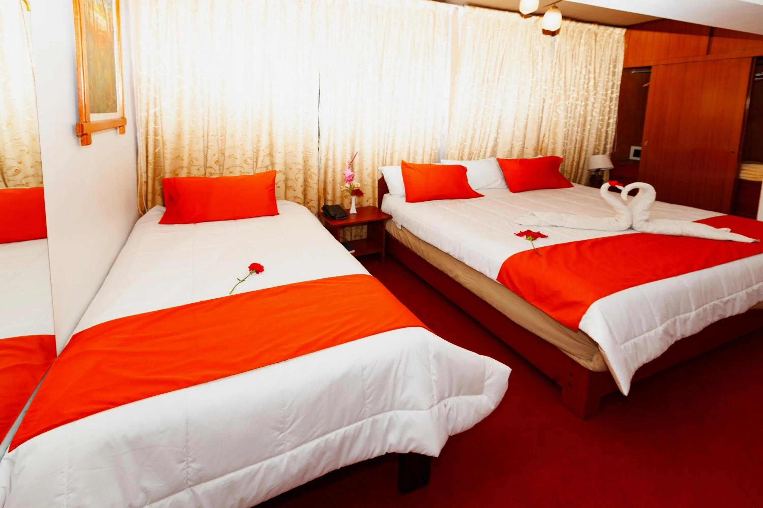 Bed in Hotel Sol del Oriente Cusco