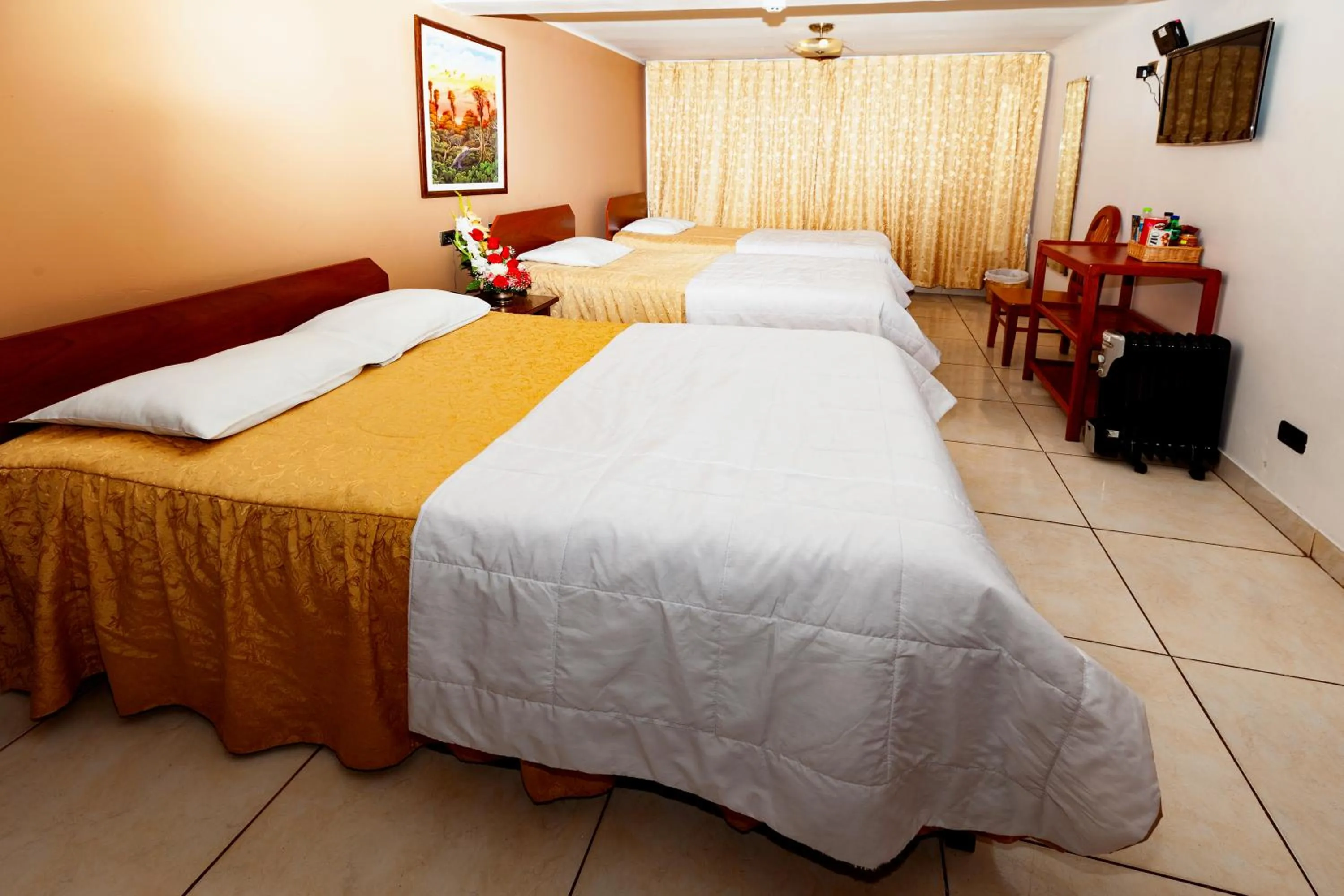 Bed in Hotel Sol del Oriente Cusco