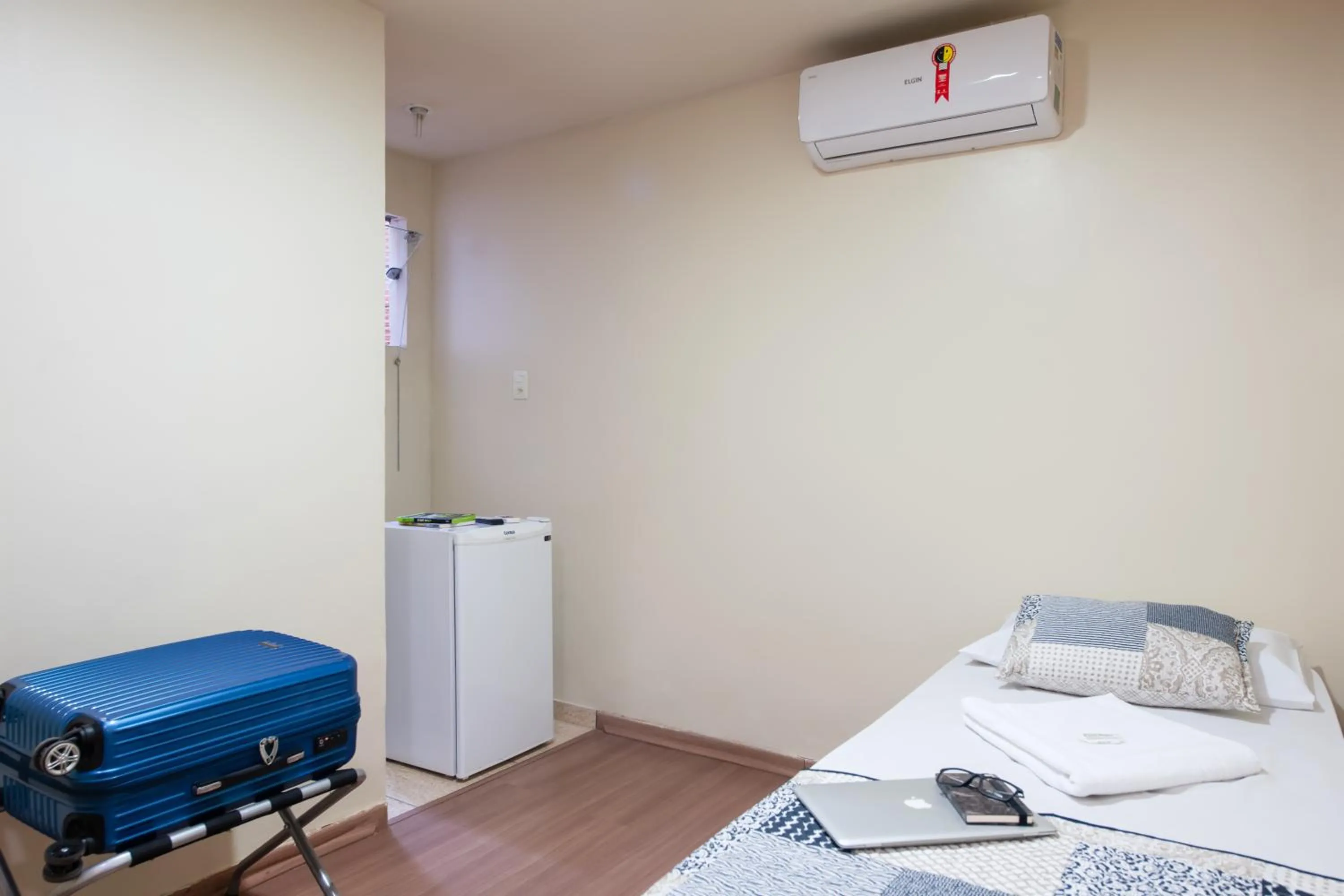 Bed in Hotel Pouso Alegre