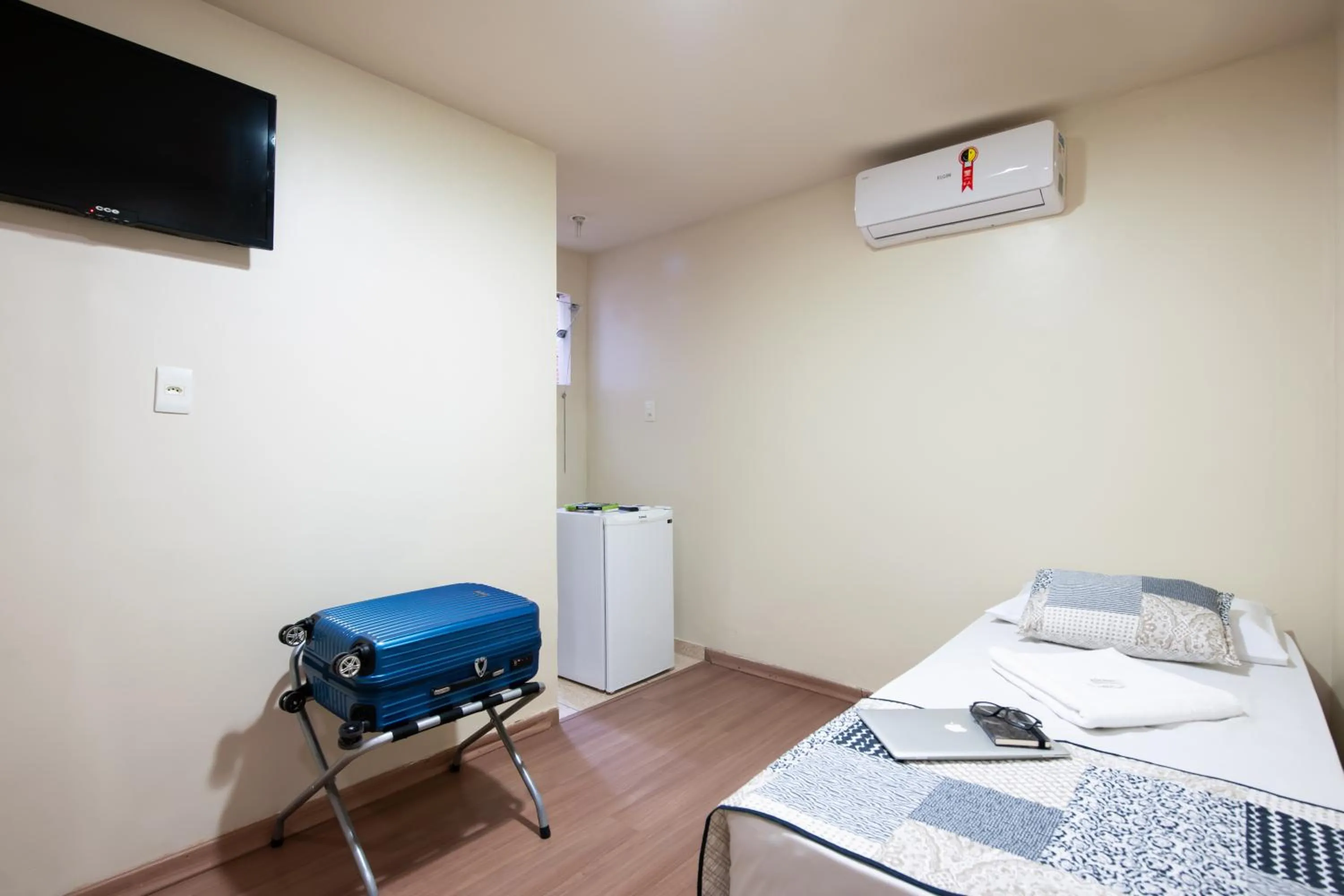 Bed in Hotel Pouso Alegre