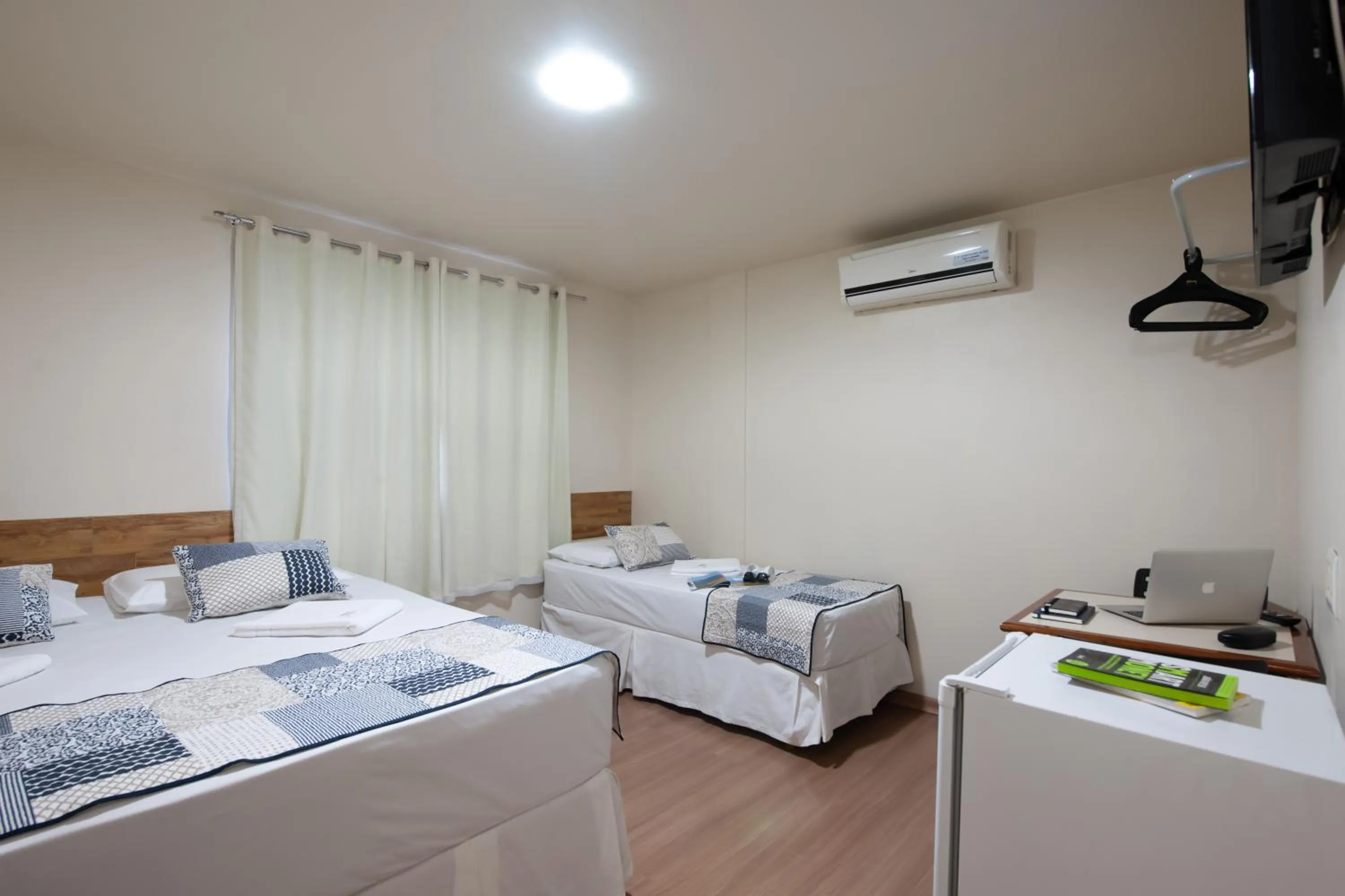 Bed in Hotel Pouso Alegre