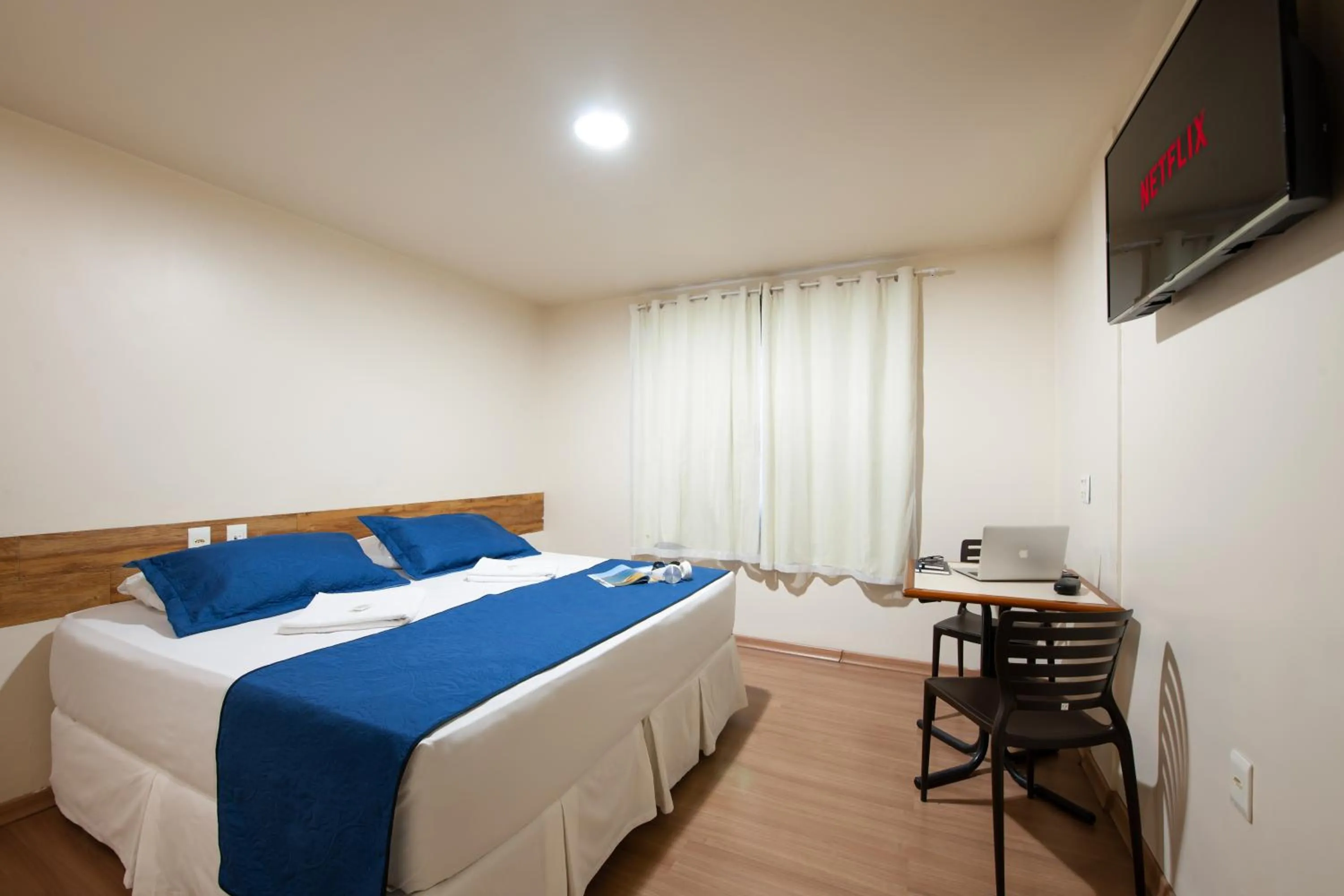 Bed in Hotel Pouso Alegre