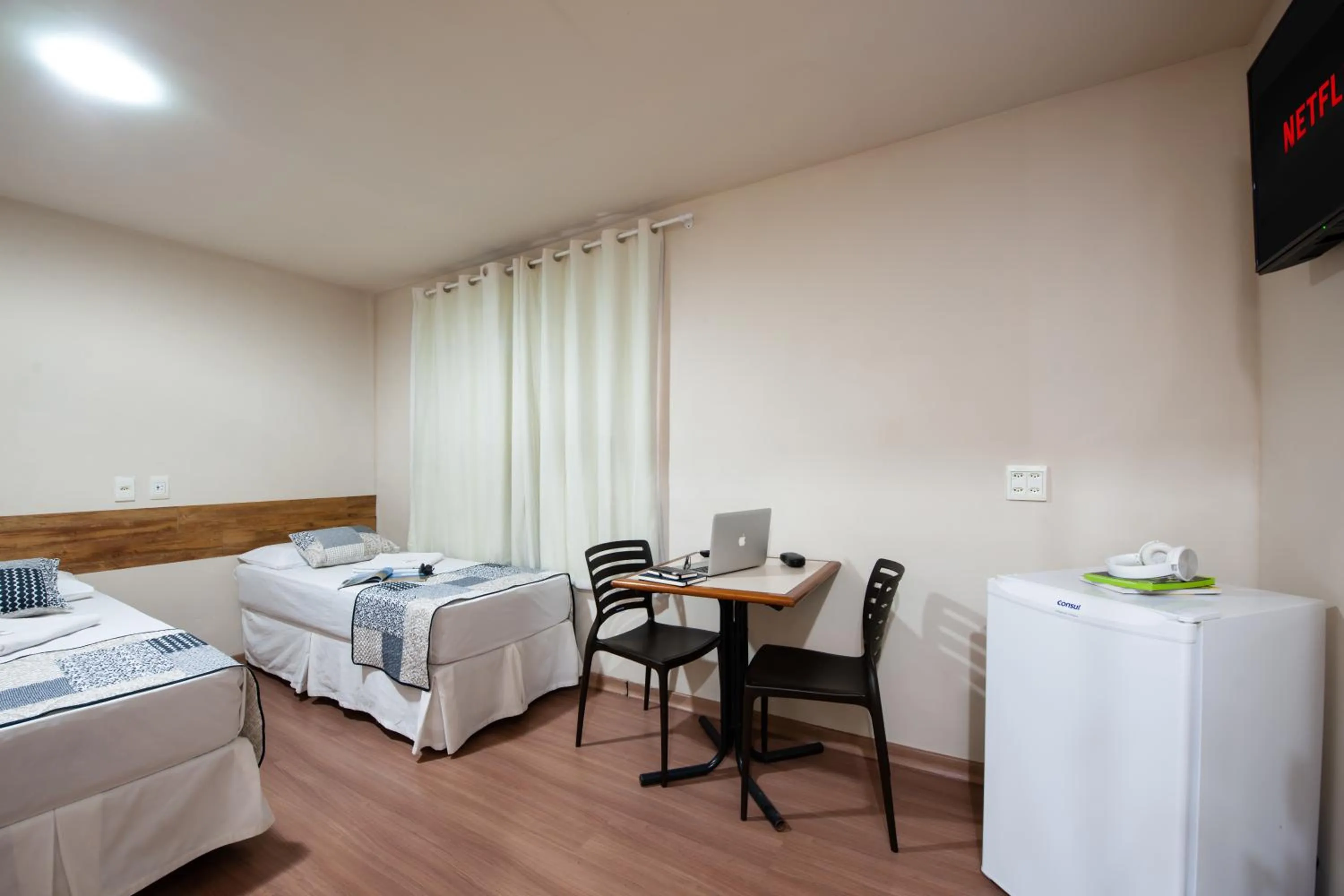 Bed in Hotel Pouso Alegre