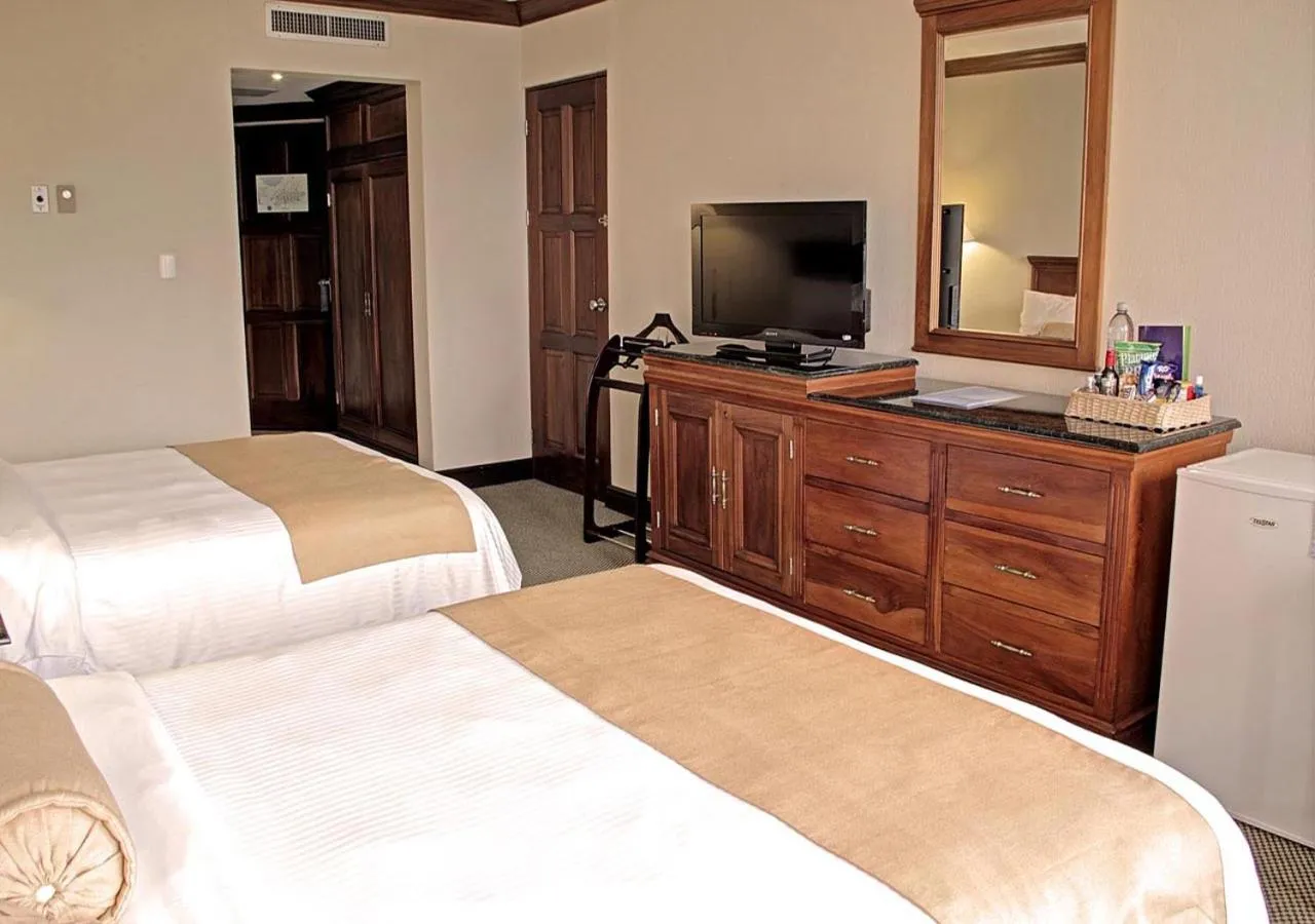 Photo of the whole room, Bed in Wyndham San Jose Herradura