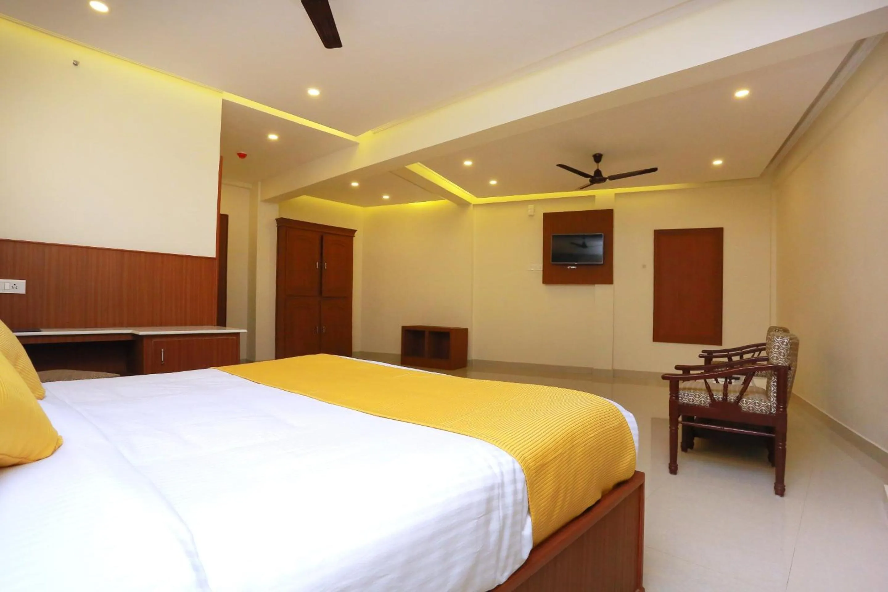 Bedroom, Bed in Super Capital O Kovilakam Residency
