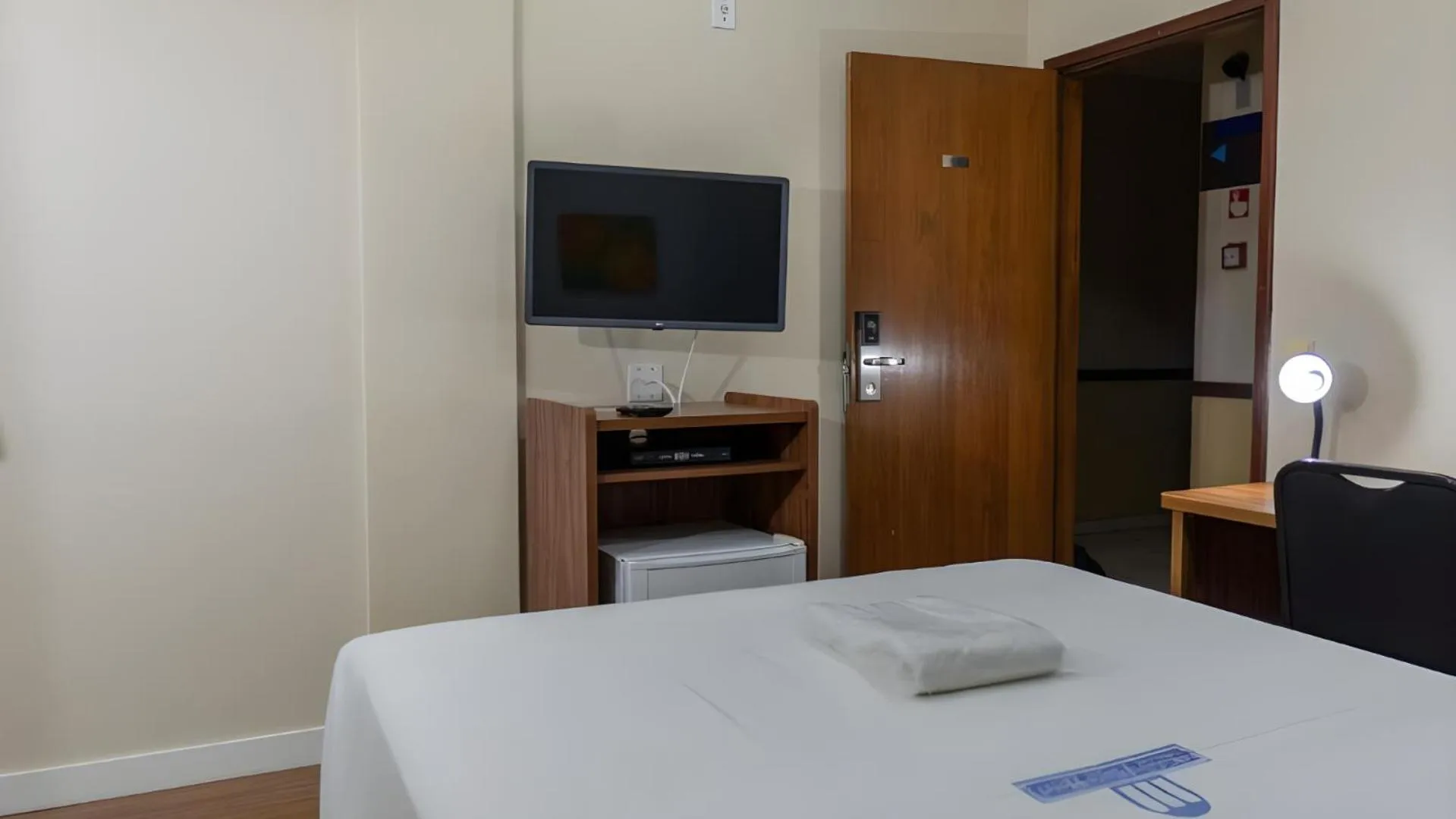 Bed in Nobile Plaza Hotel