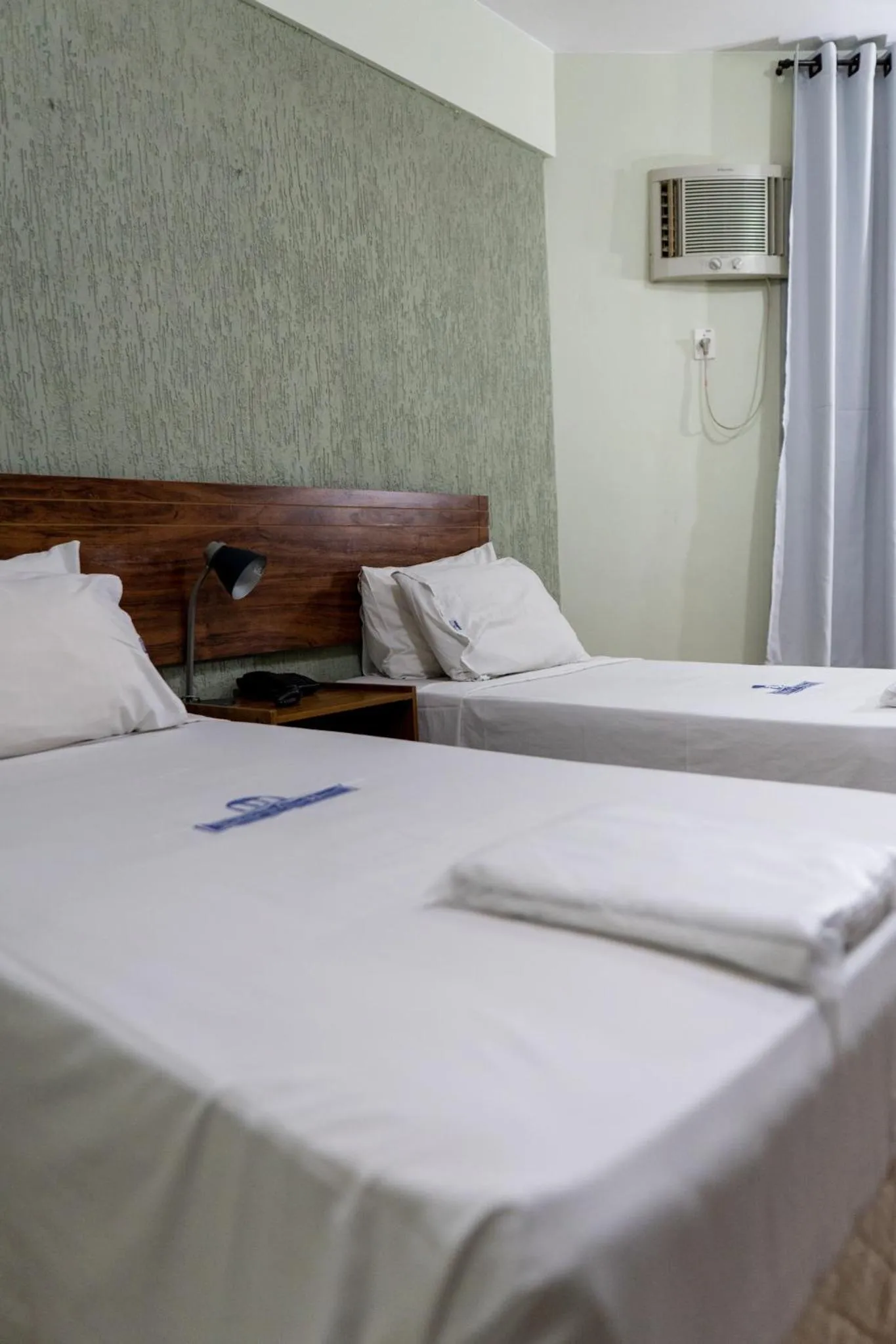 Bed in Nobile Plaza Hotel