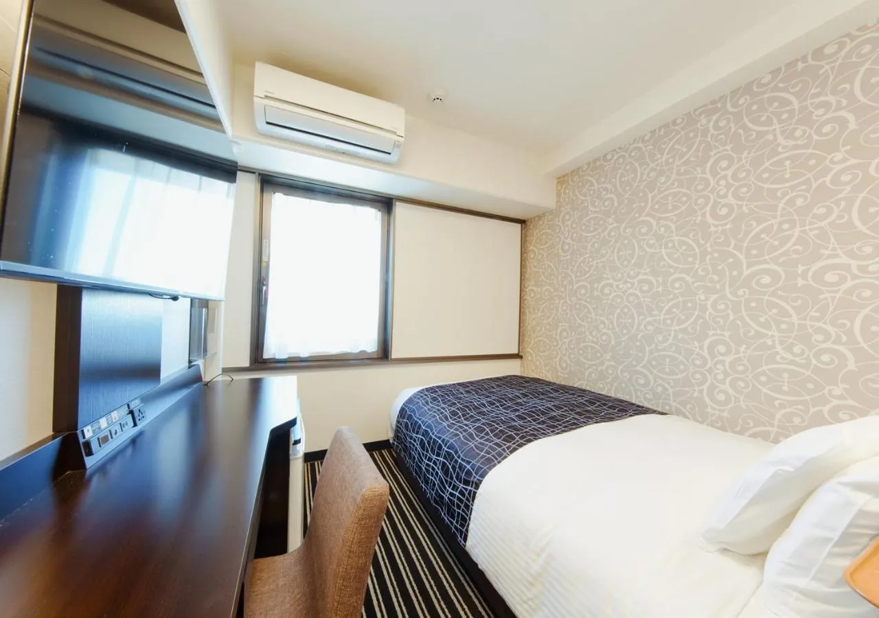 Photo of the whole room, Bed in APA Hotel Osaka Temma