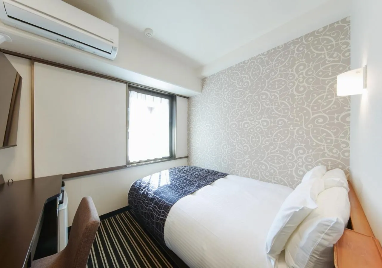 Photo of the whole room, Bed in APA Hotel Osaka Temma