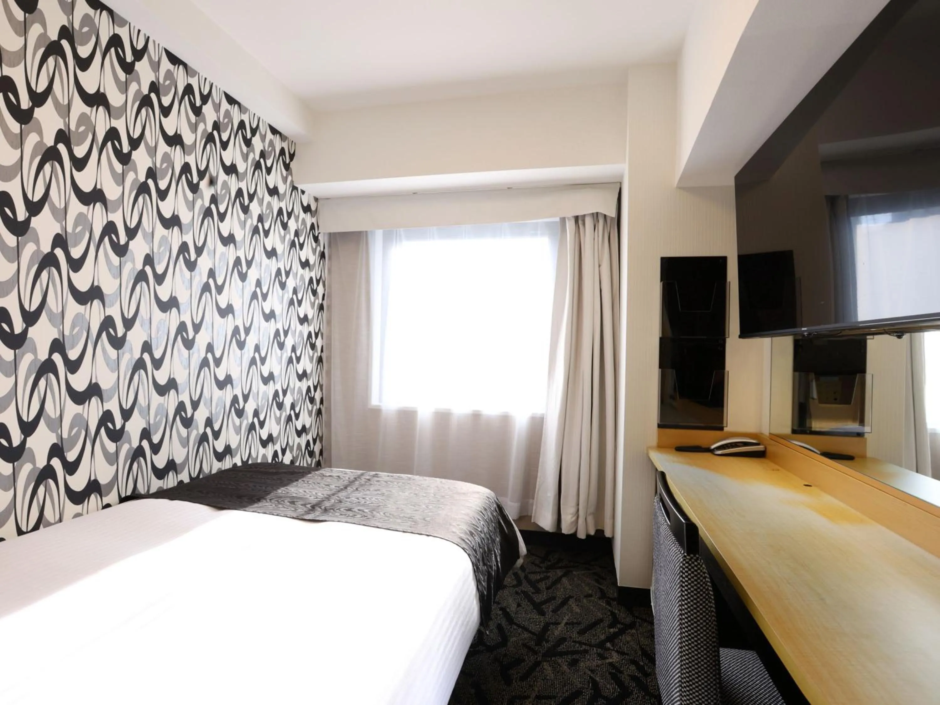 Bed in APA Hotel Ikebukuro Eki Kitaguchi