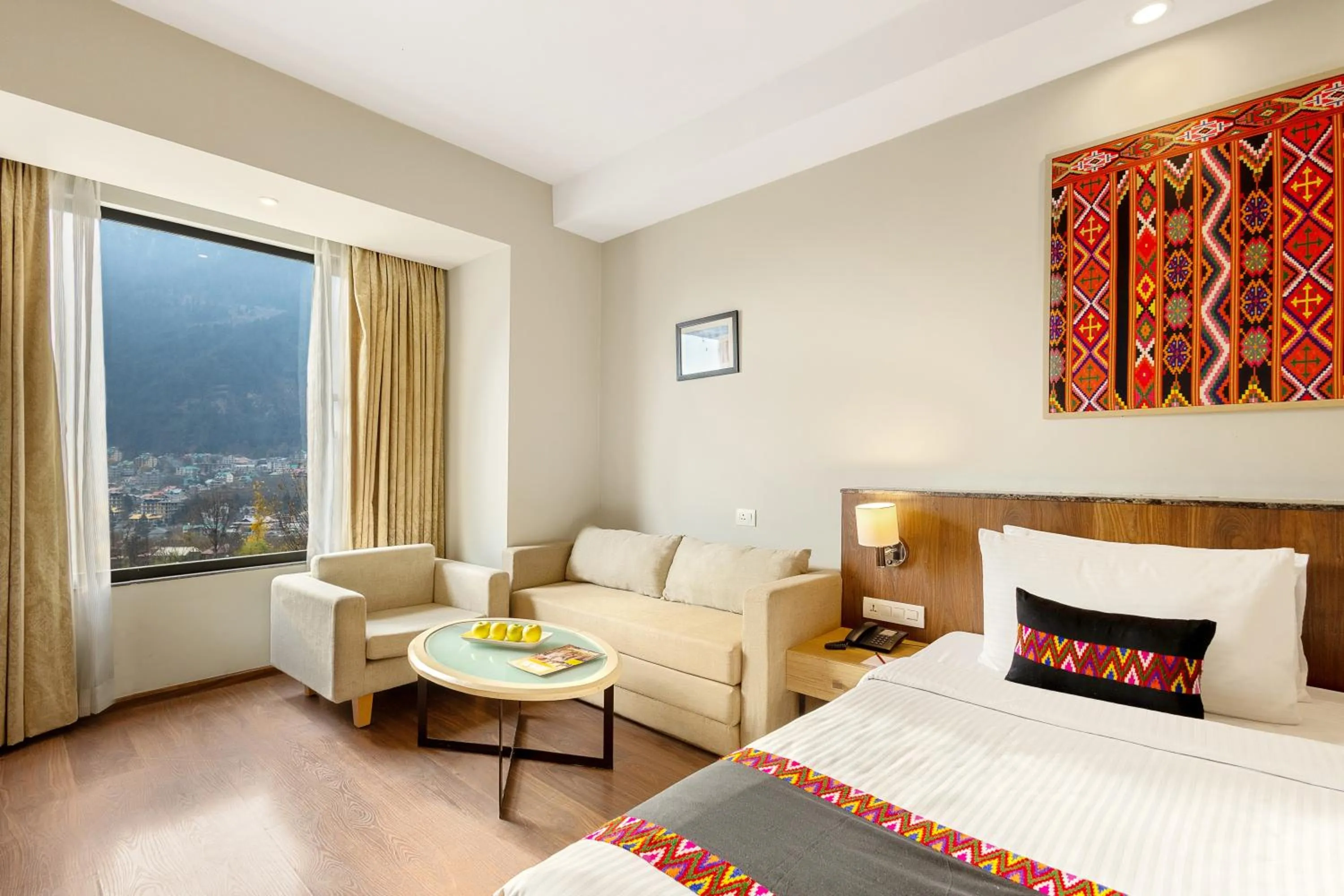 Seating area, Bed in Sterling Manali
