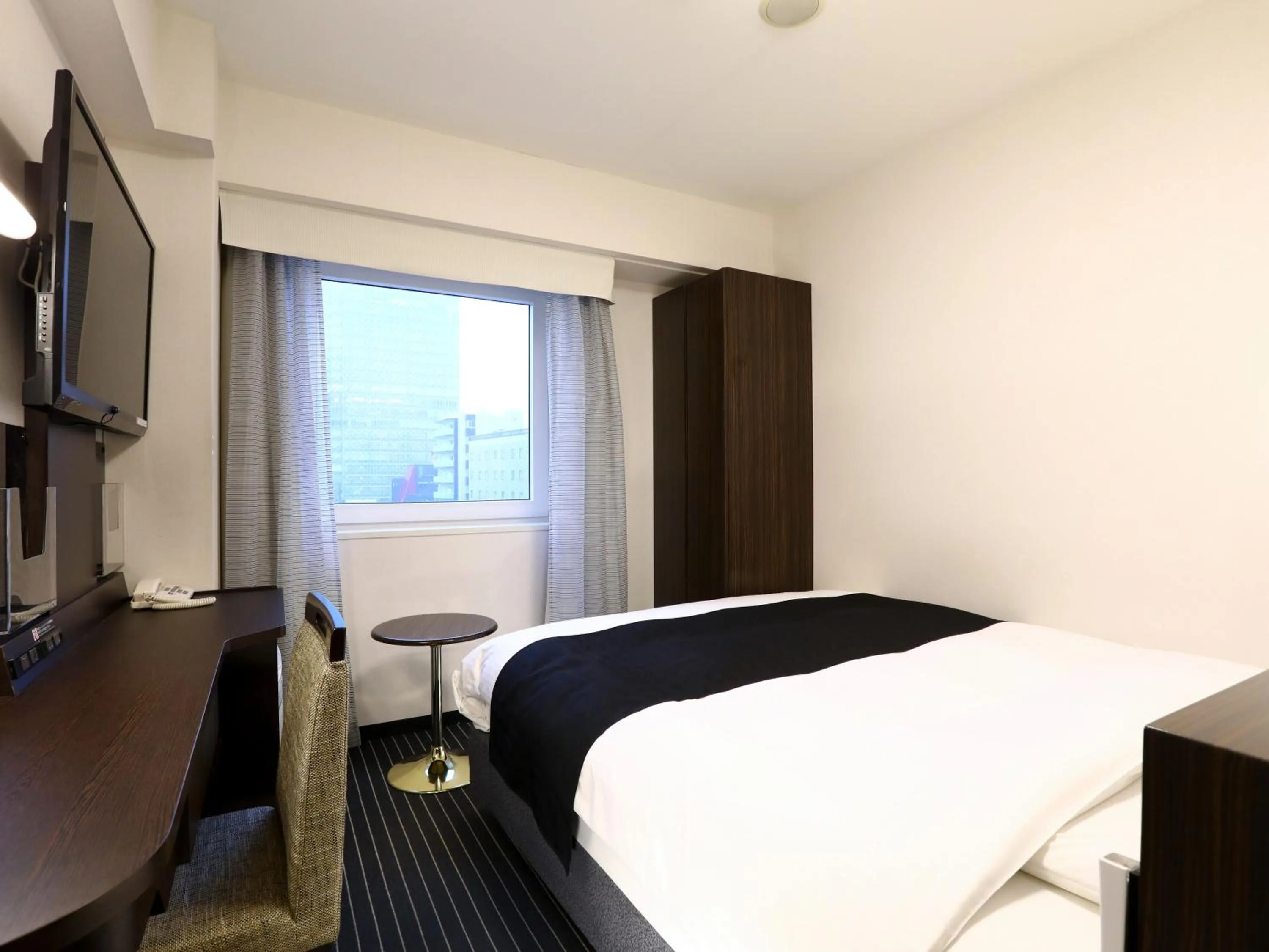 Photo of the whole room, Bed in APA Hotel Akasaka Mitsuke