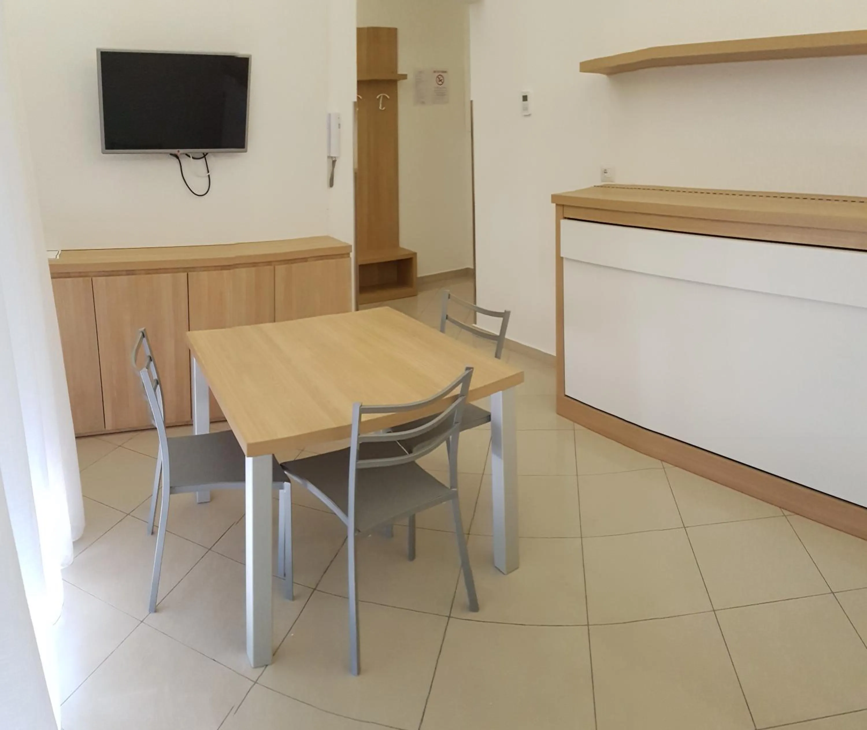 Communal lounge/ TV room in Residence Perla