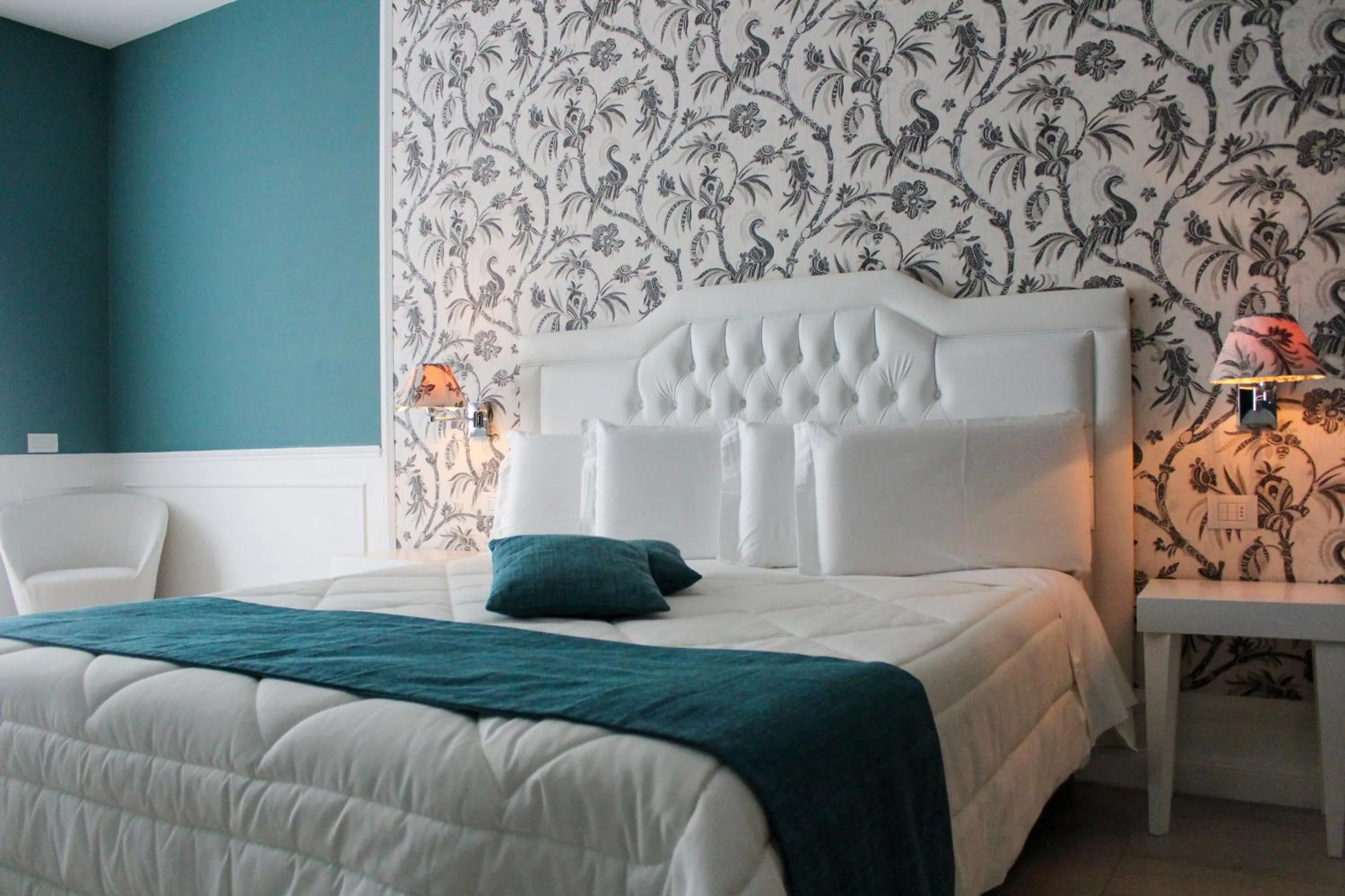 Bed in Bianco Riccio Suite Hotel