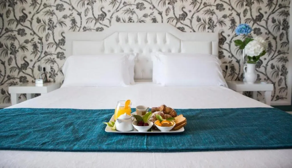 Bed in Bianco Riccio Suite Hotel