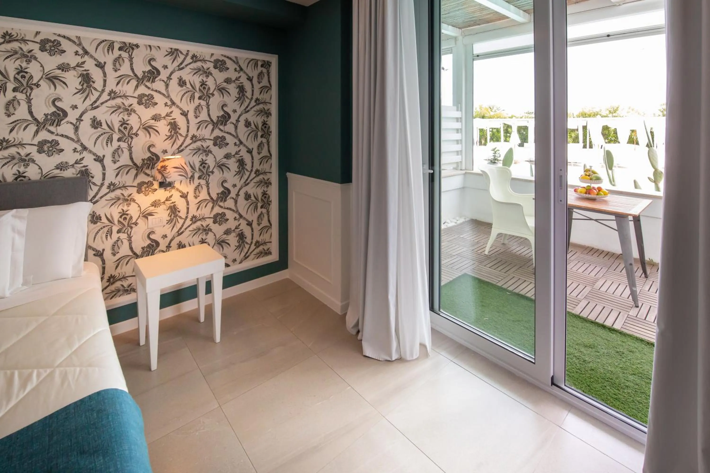 Bed in Bianco Riccio Suite Hotel