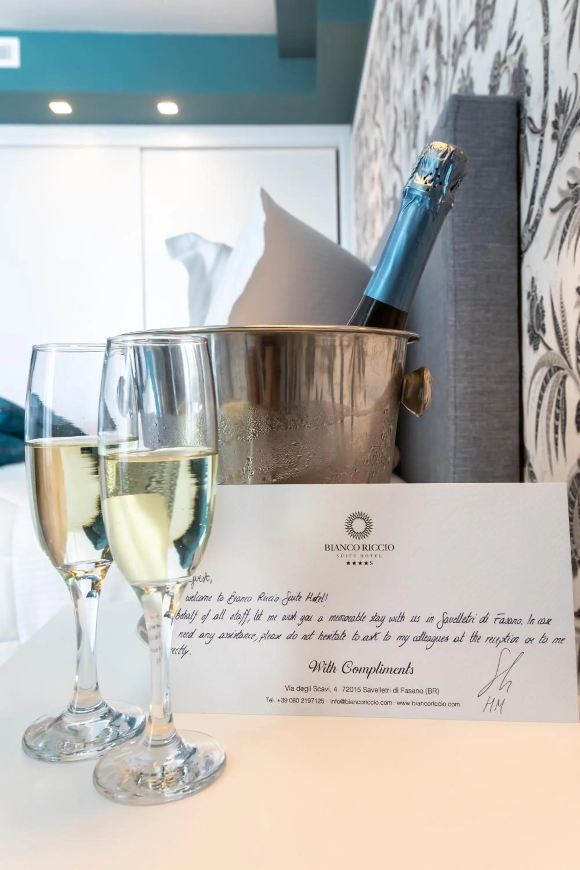 Property logo or sign in Bianco Riccio Suite Hotel