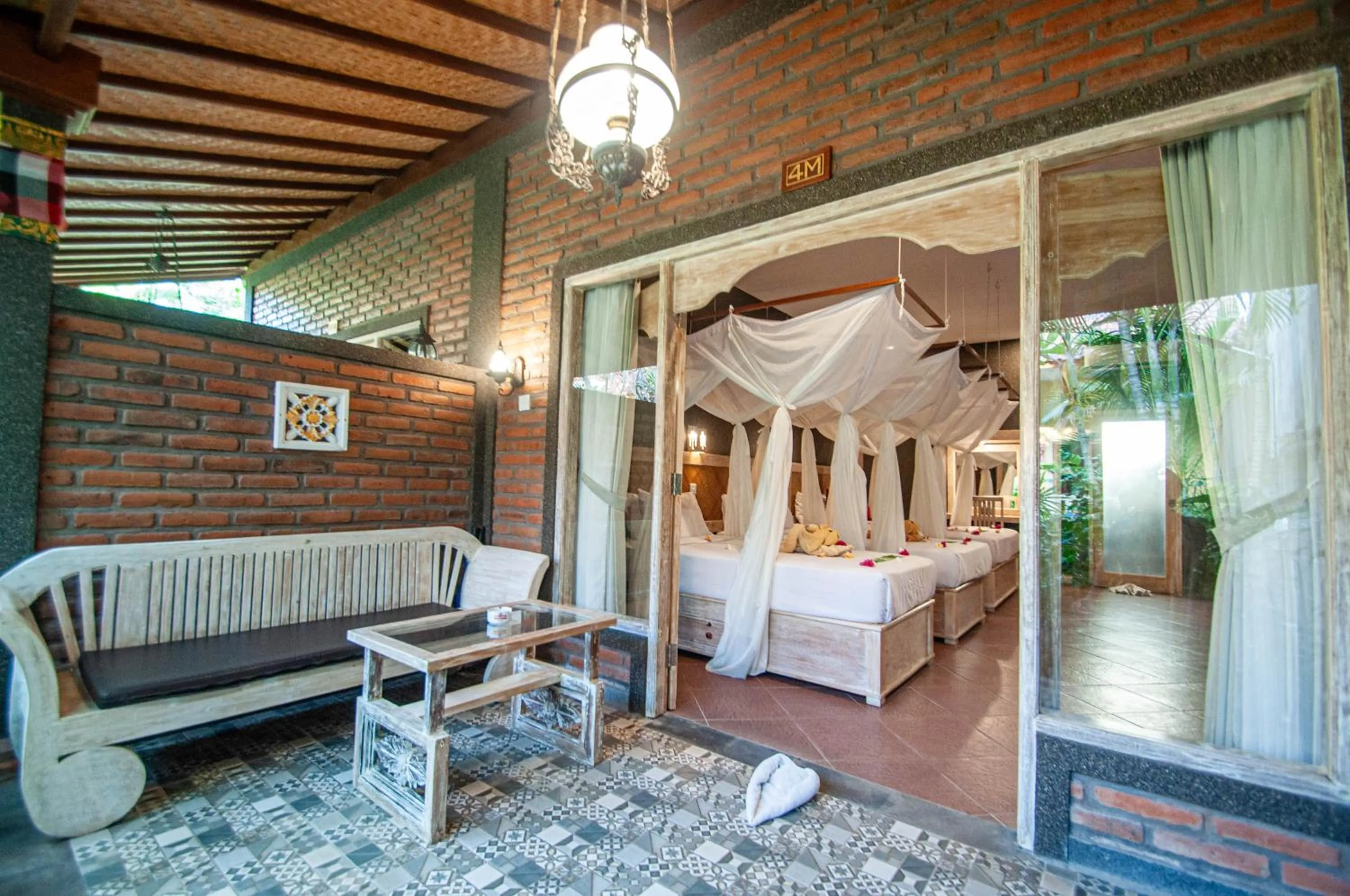 Seating area, Bed in Kubuku Eco Dive Lodge and Yoga