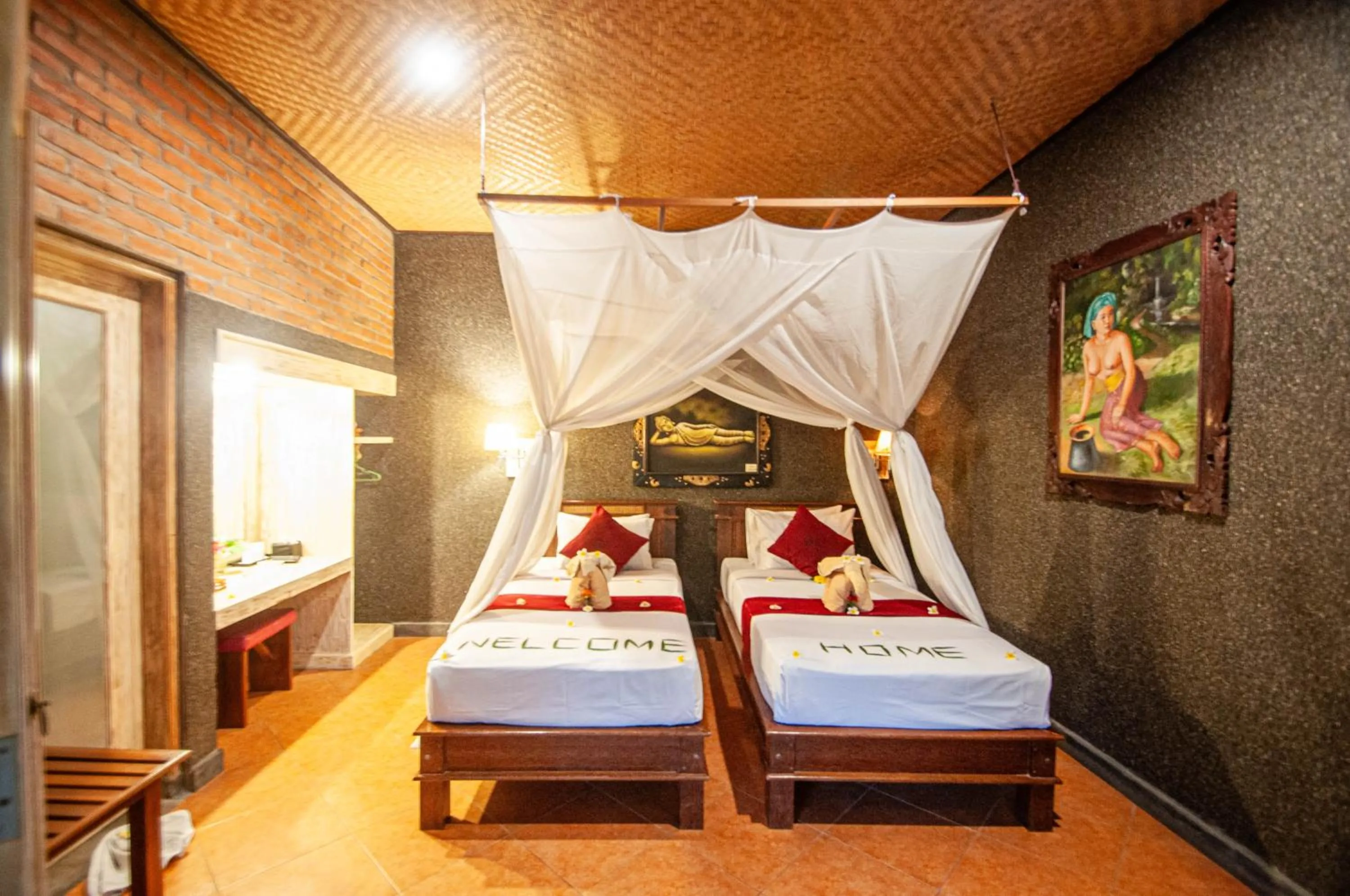 Bed in Kubuku Eco Dive Lodge and Yoga