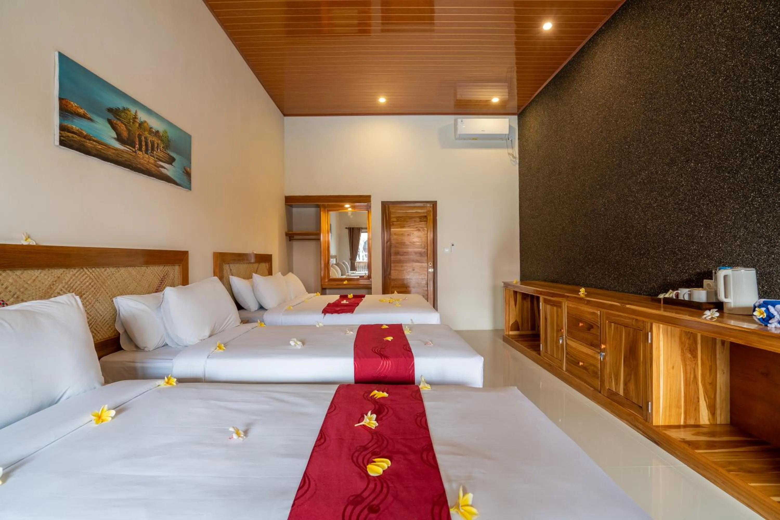 Bed in Kubuku Eco Dive Lodge and Yoga
